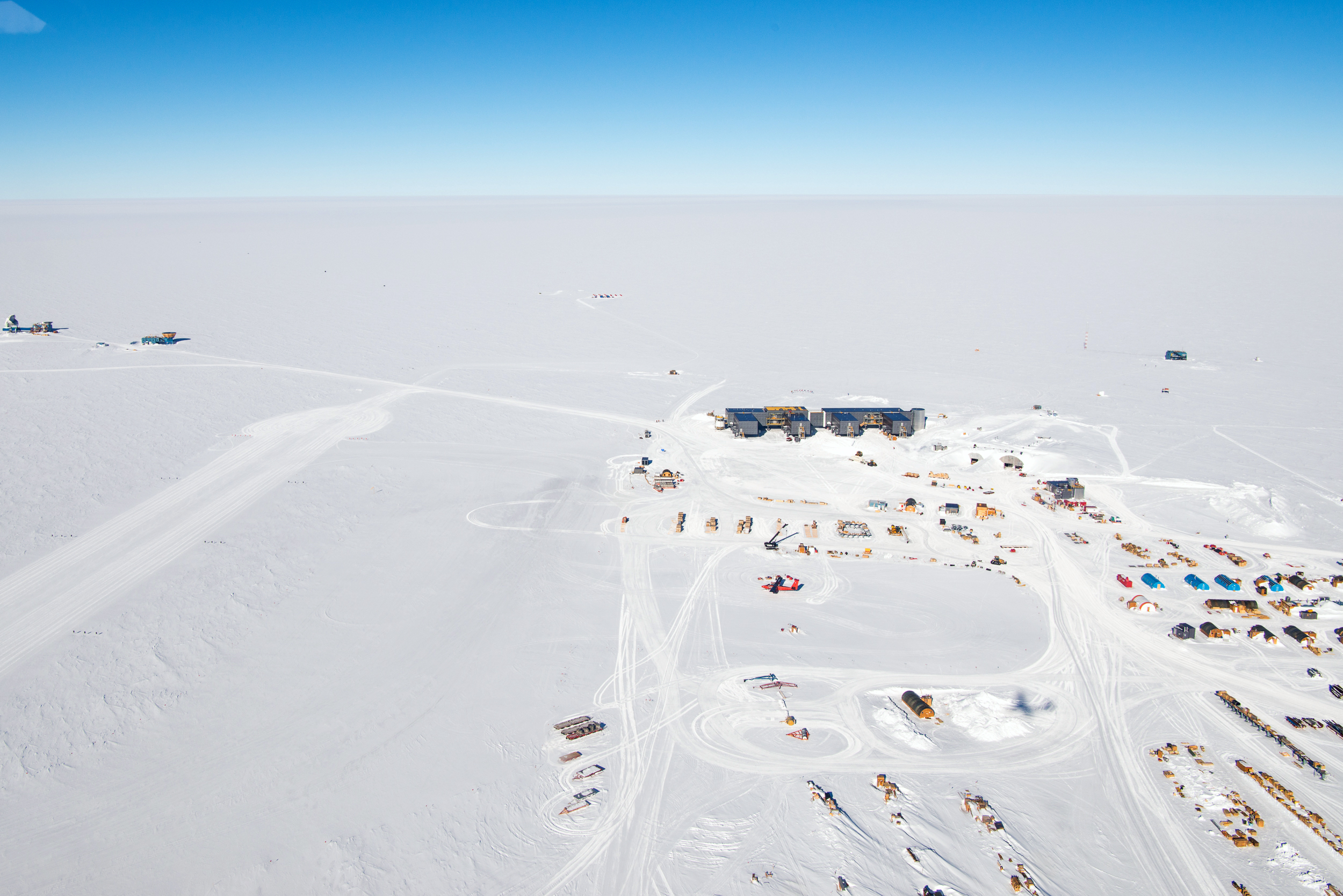 Aerial view of buildings on snow.
