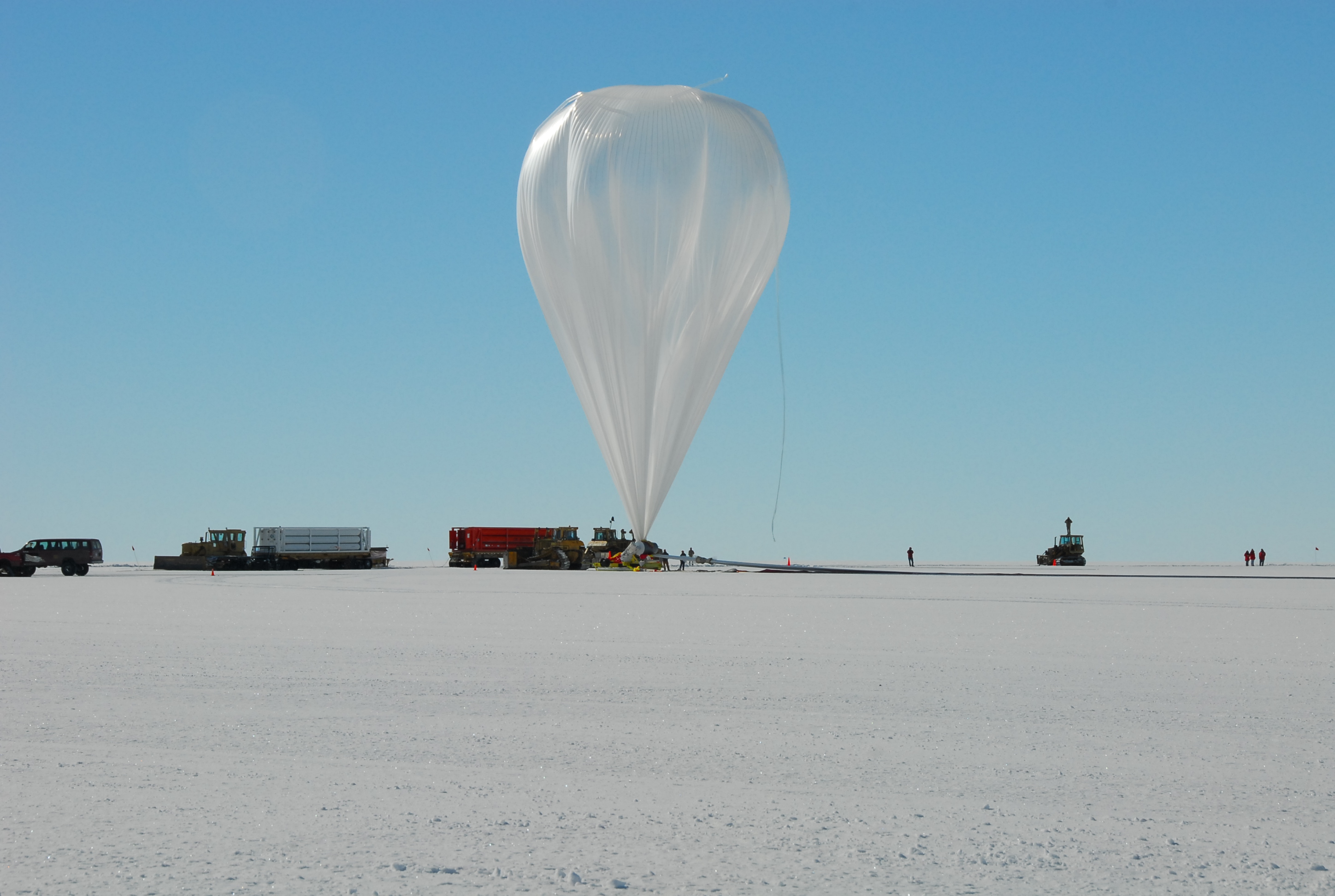 An enormous balloon is inflated for deploying to the atmosphere.