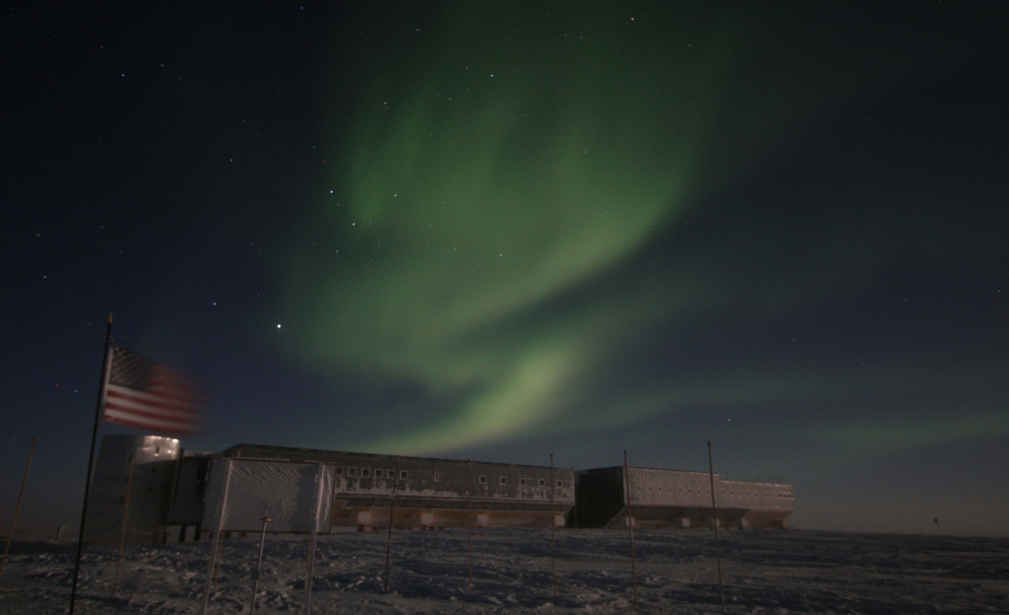 Aurora display in the night sky above the U.S. research station at the South Pole.