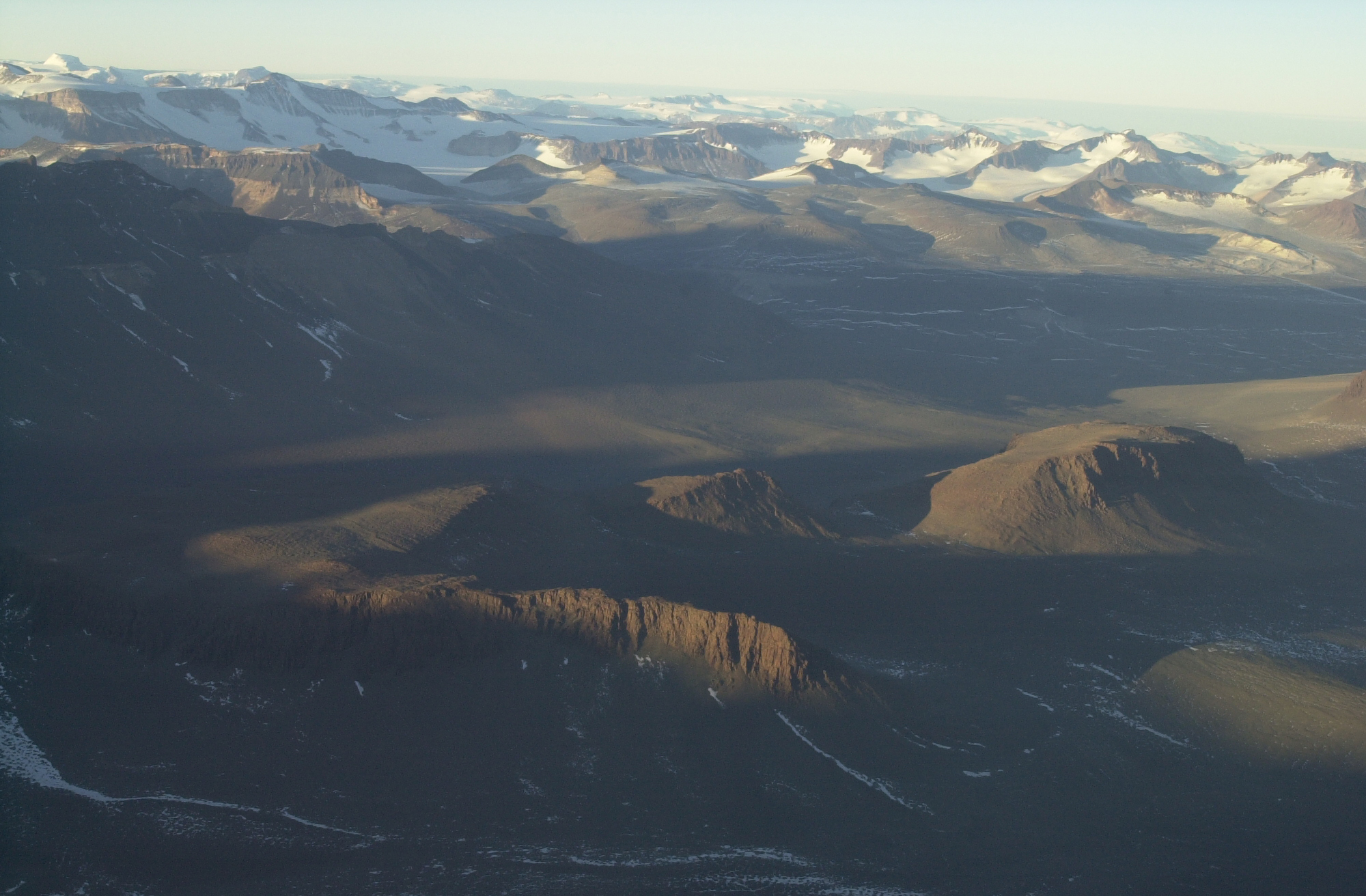 Aerial view of brown mountains.