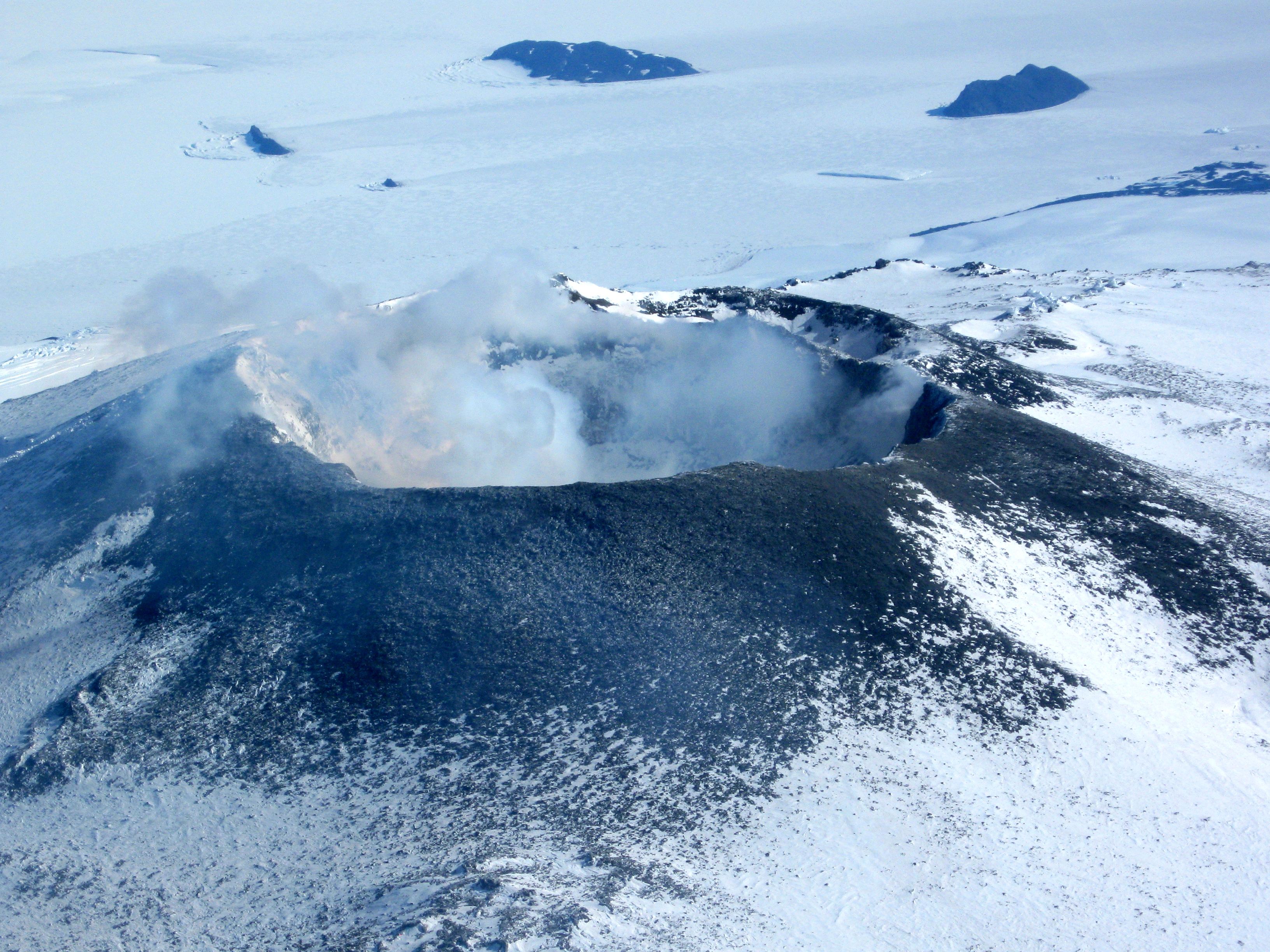 Aerial view of volcano crater.