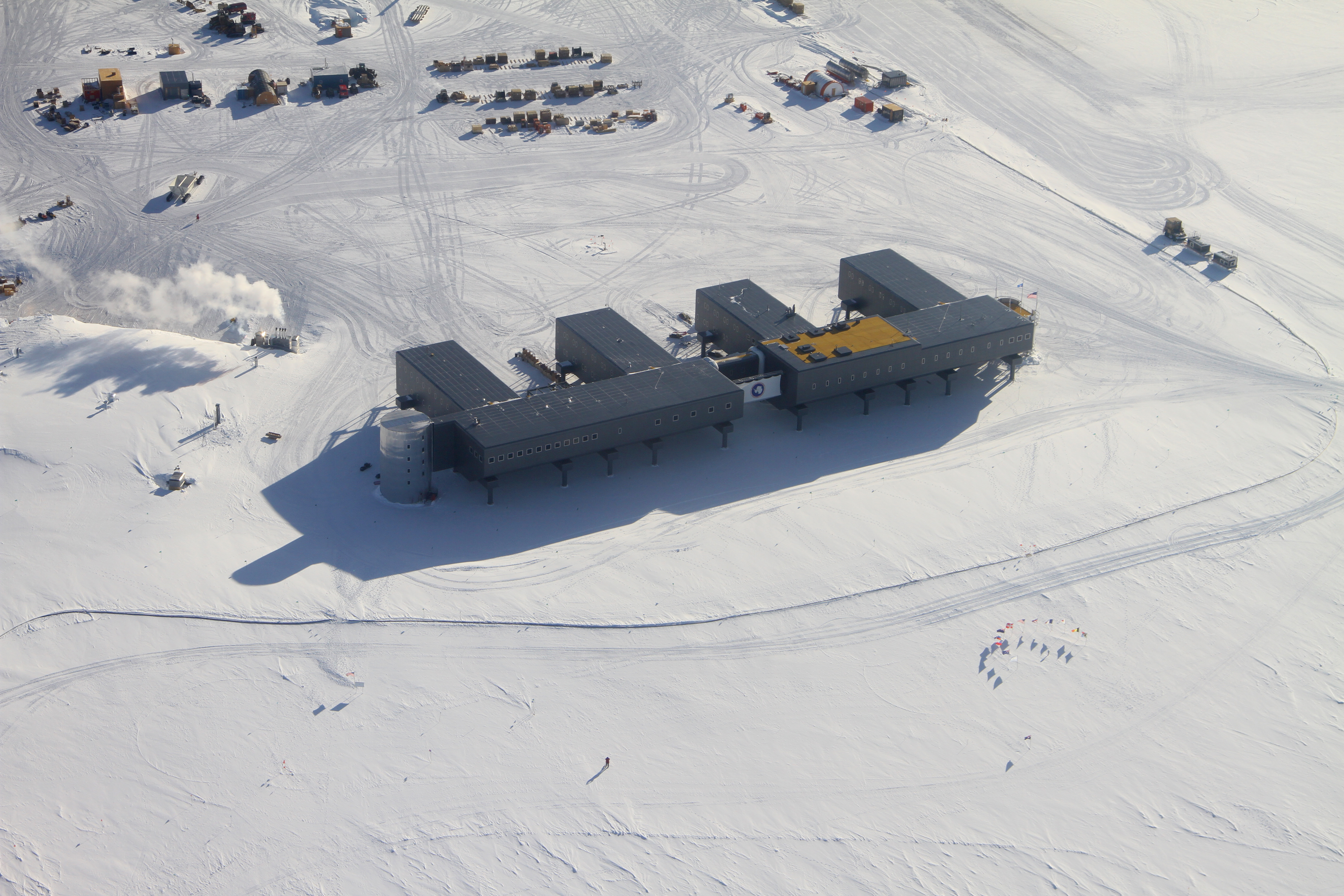 Aerial photo of buildings on snow.
