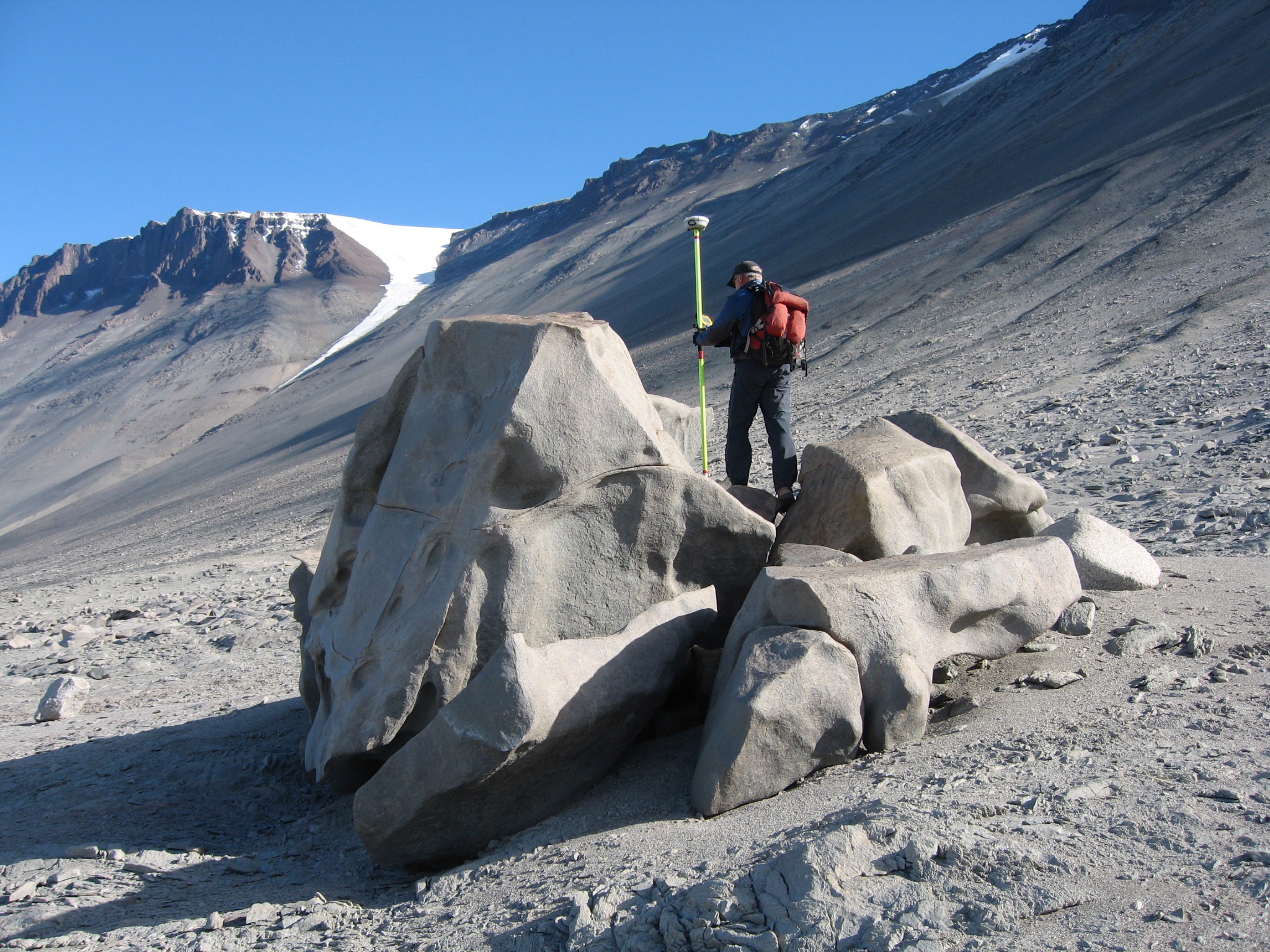 A person on rocky landscape.
