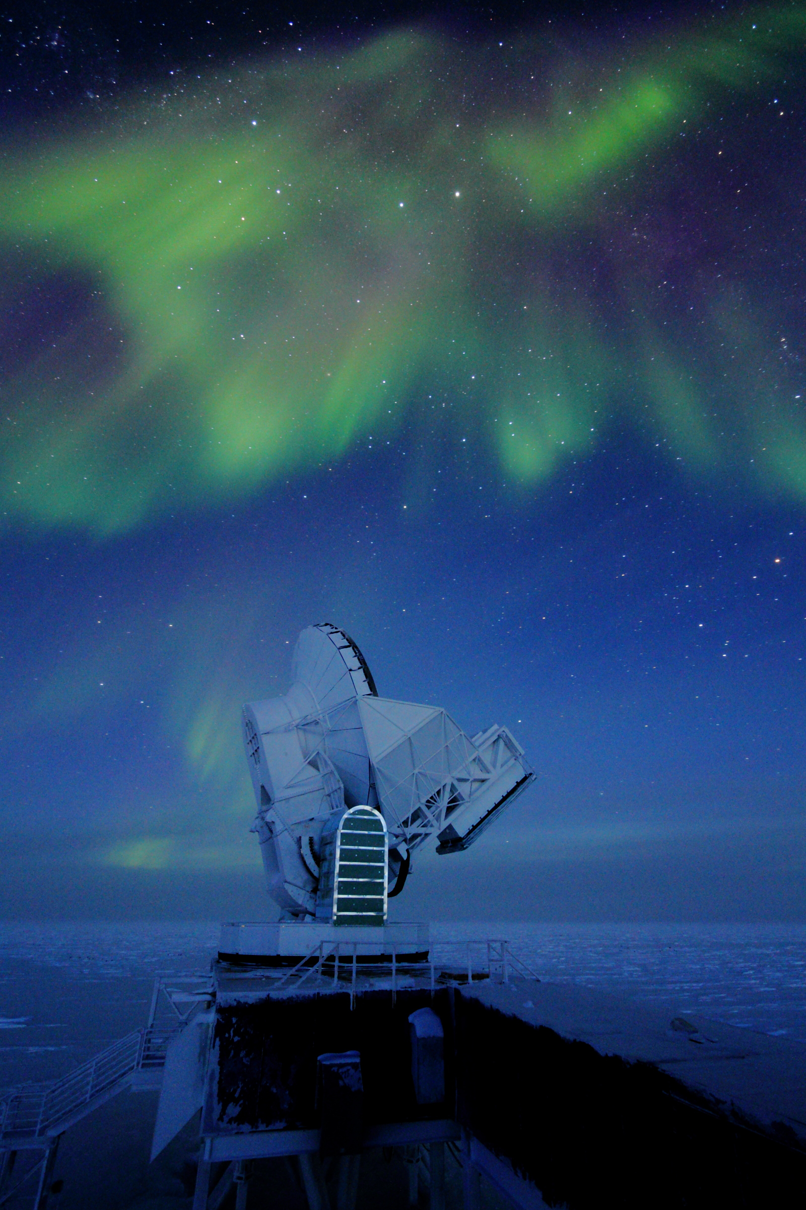 Auroras above a large telescope at a U.S. research station in Antarctica.