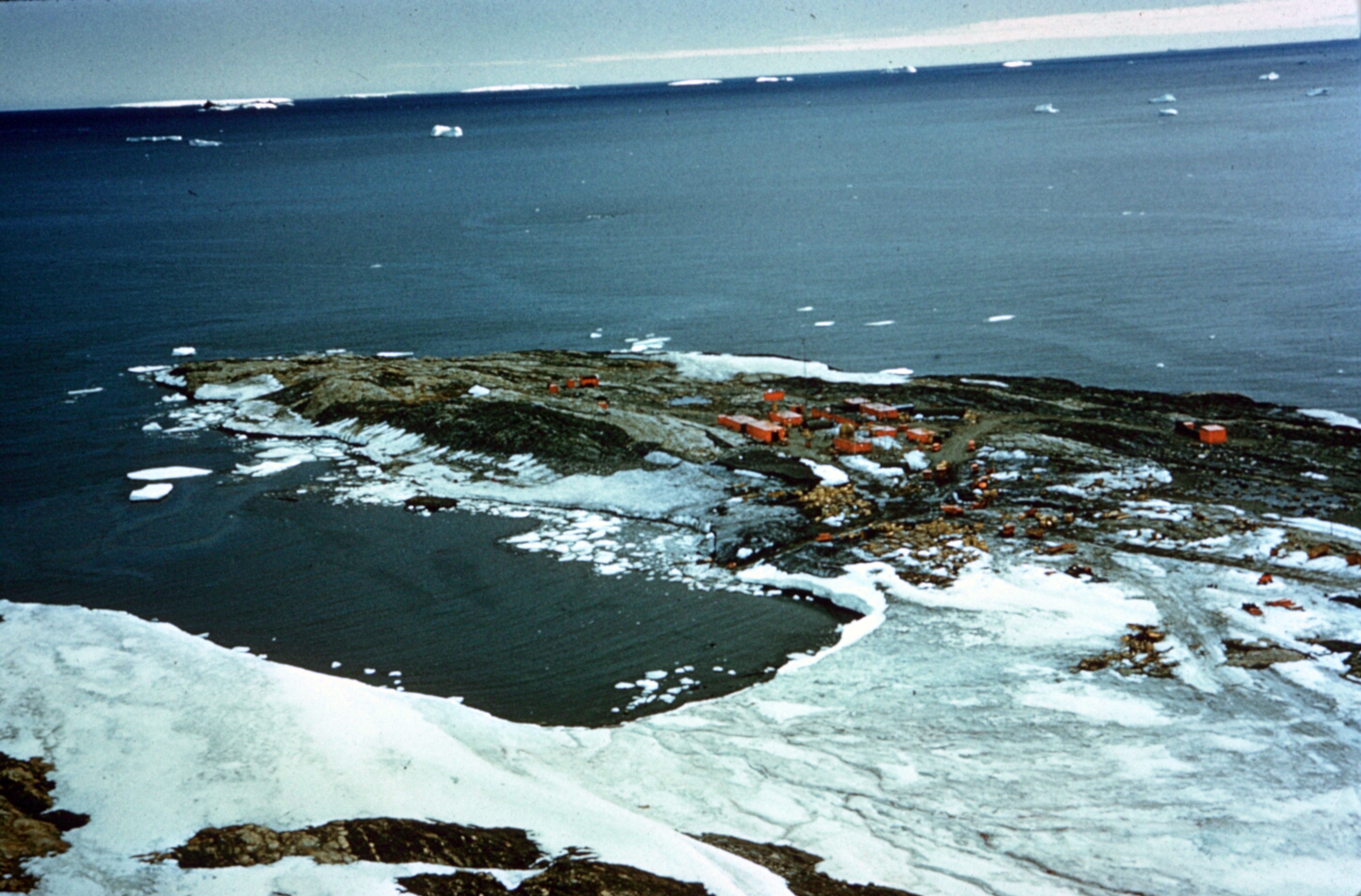 Aerial photo of buildings on peninsula.