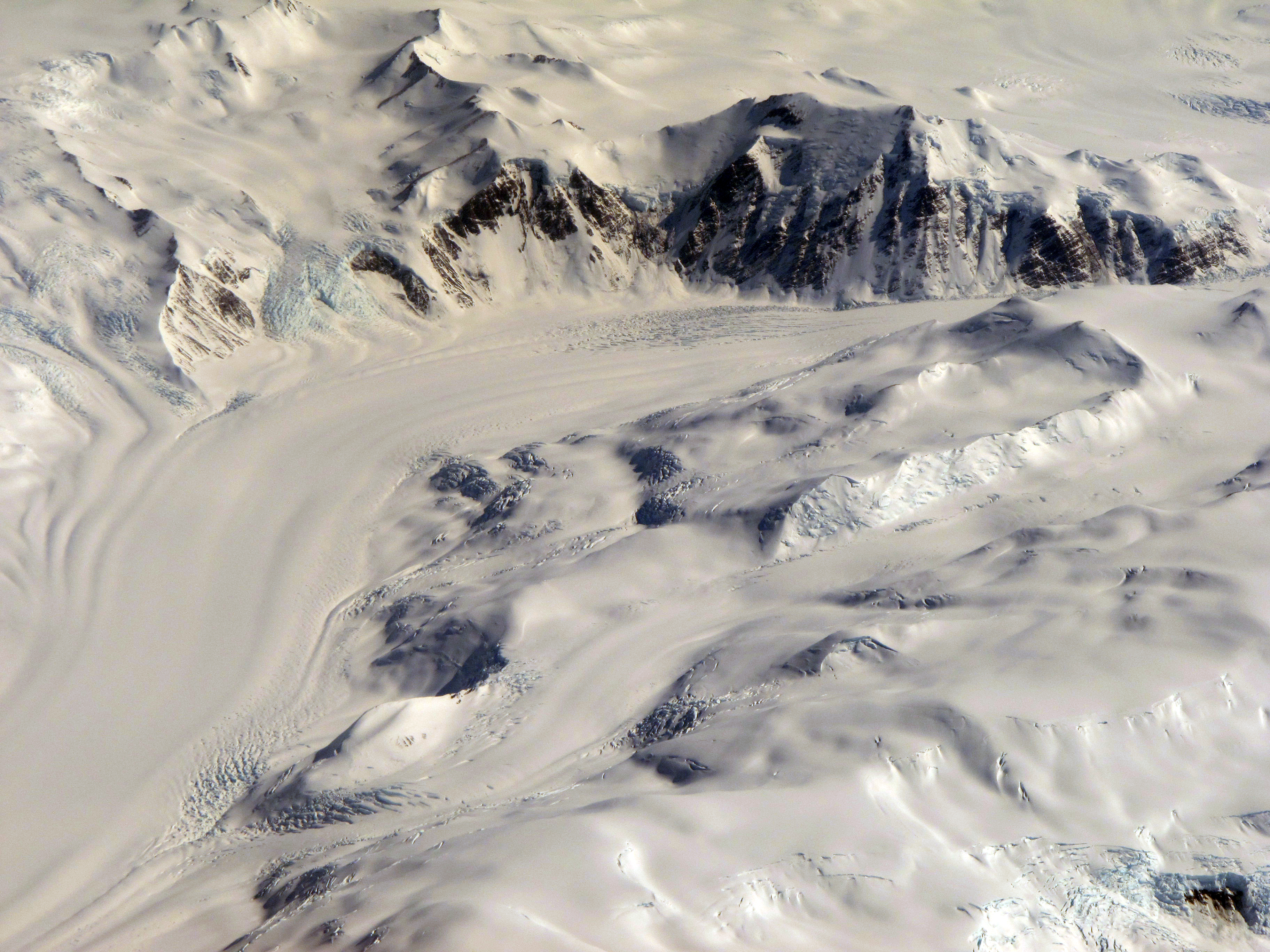 Aerial view of mountains and glaciers.