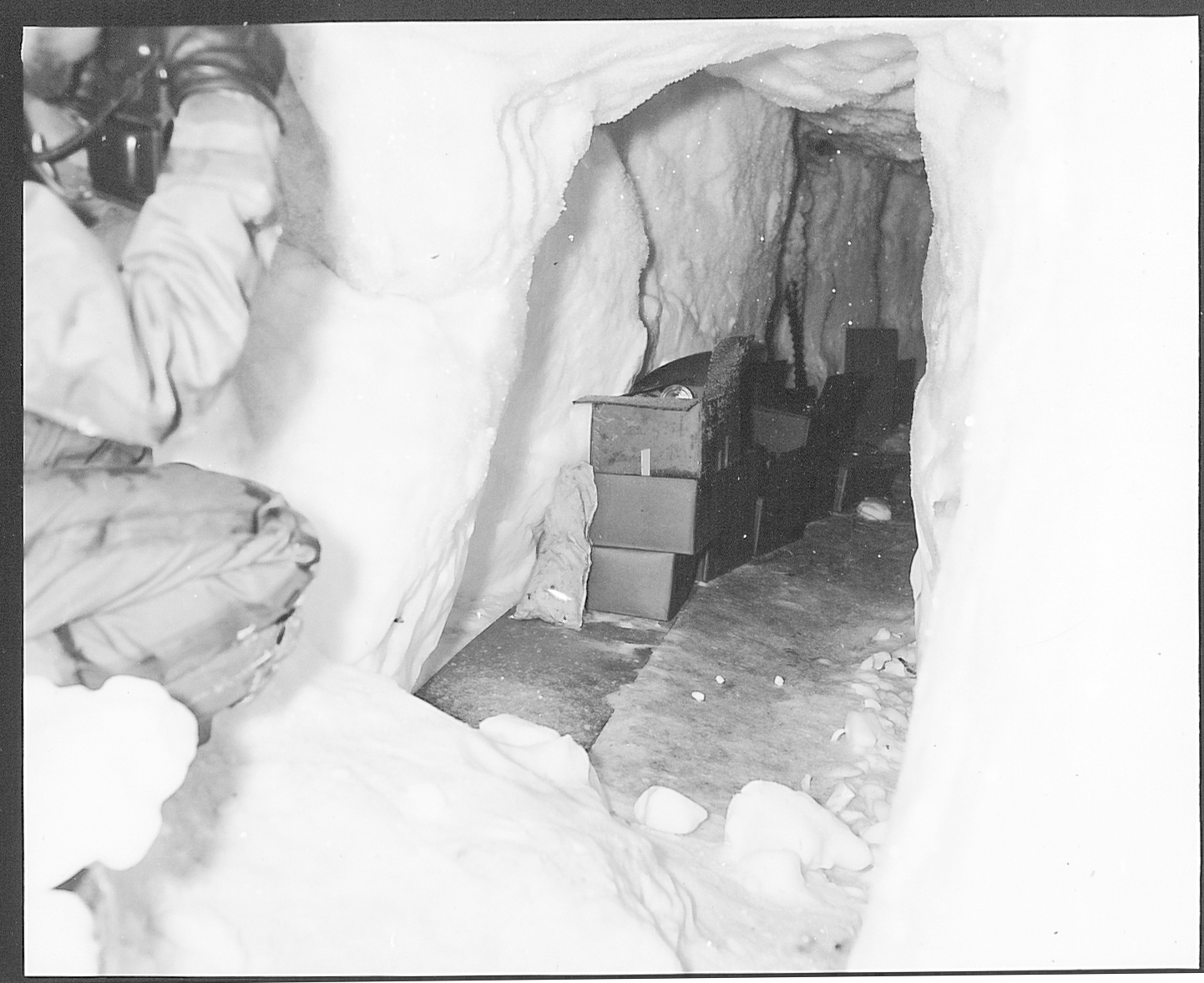 A tunnel in the ice used for storage.