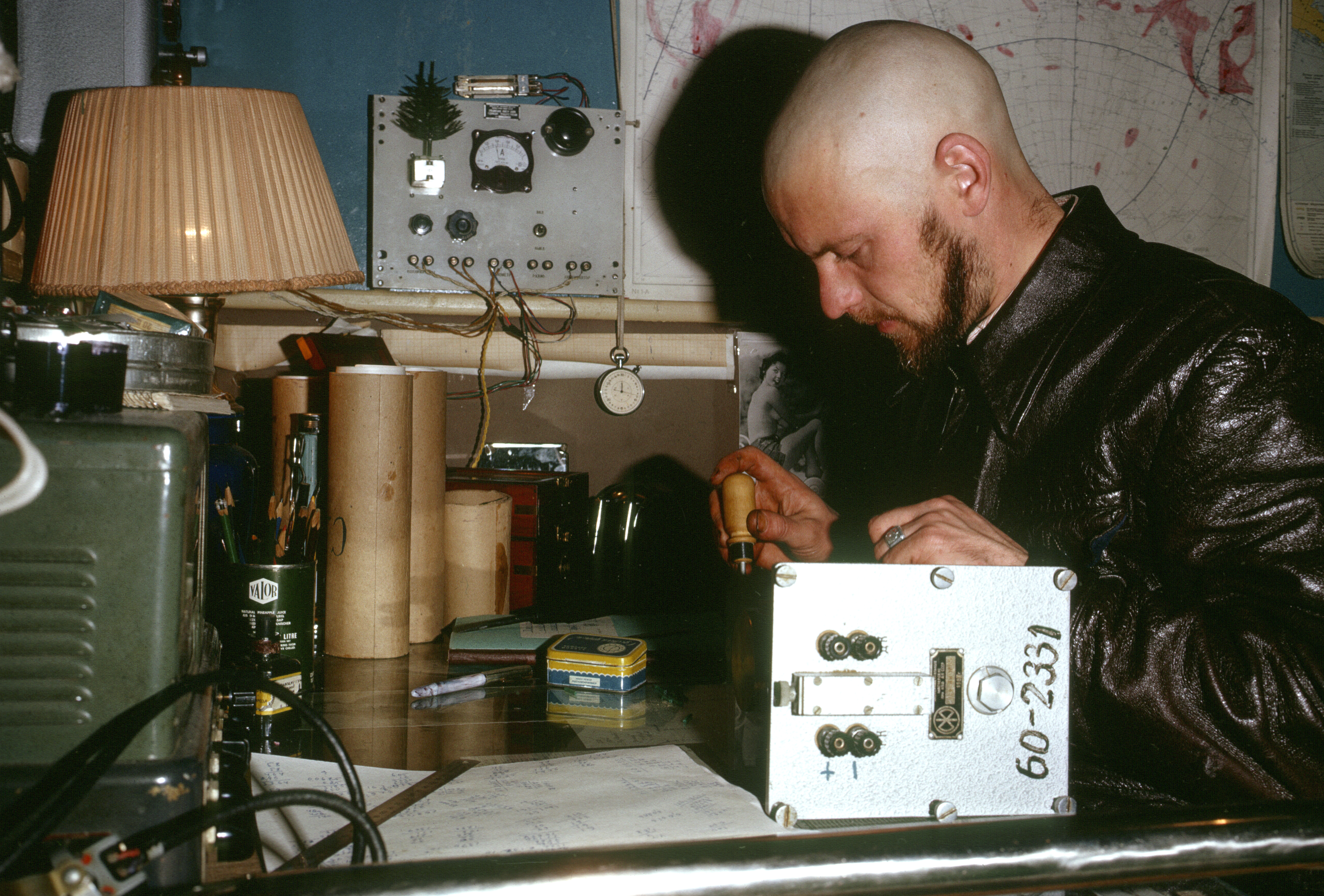 A man working on an instrument.