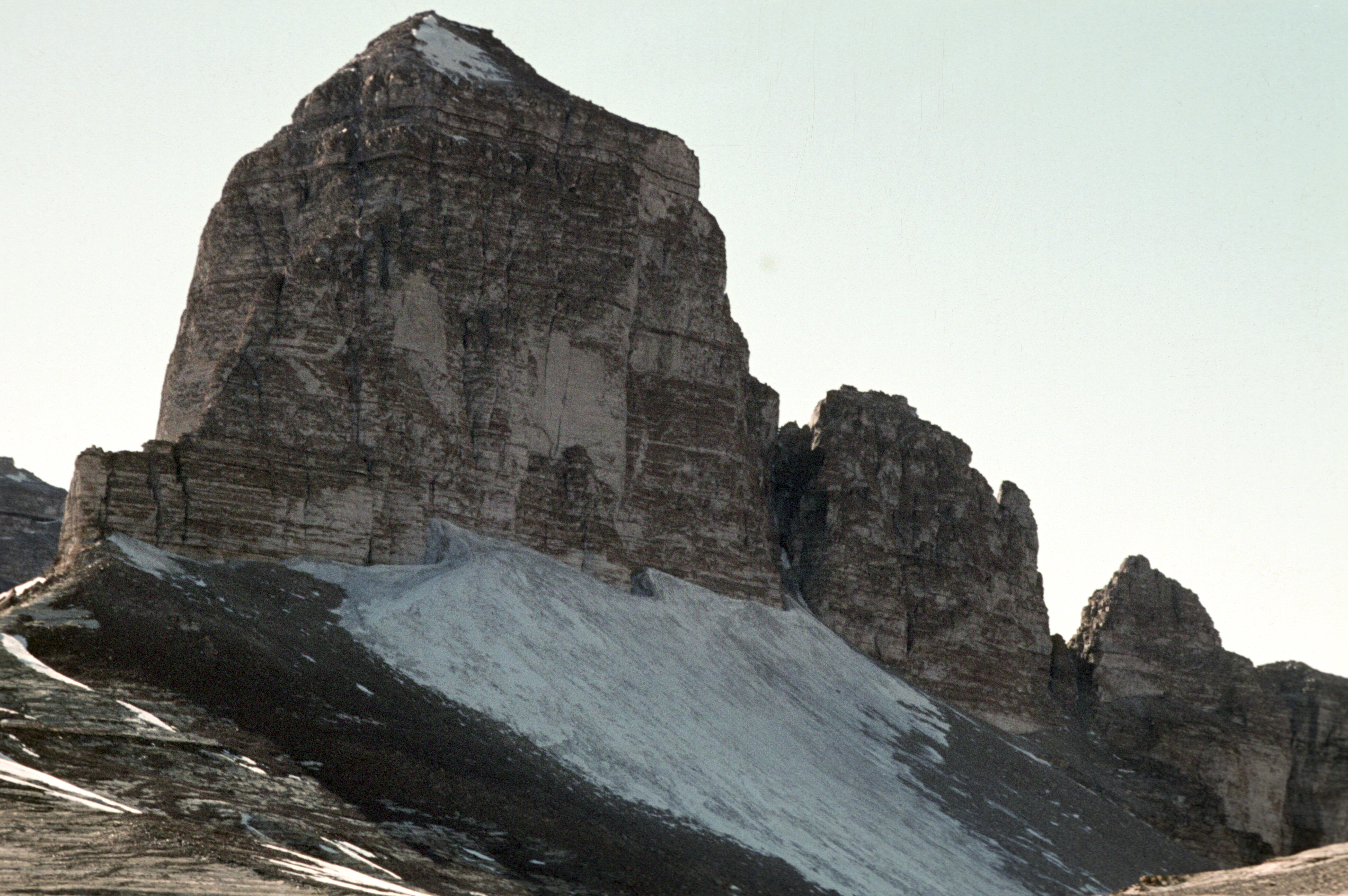 A prominent mountain peak in a rocky valley.