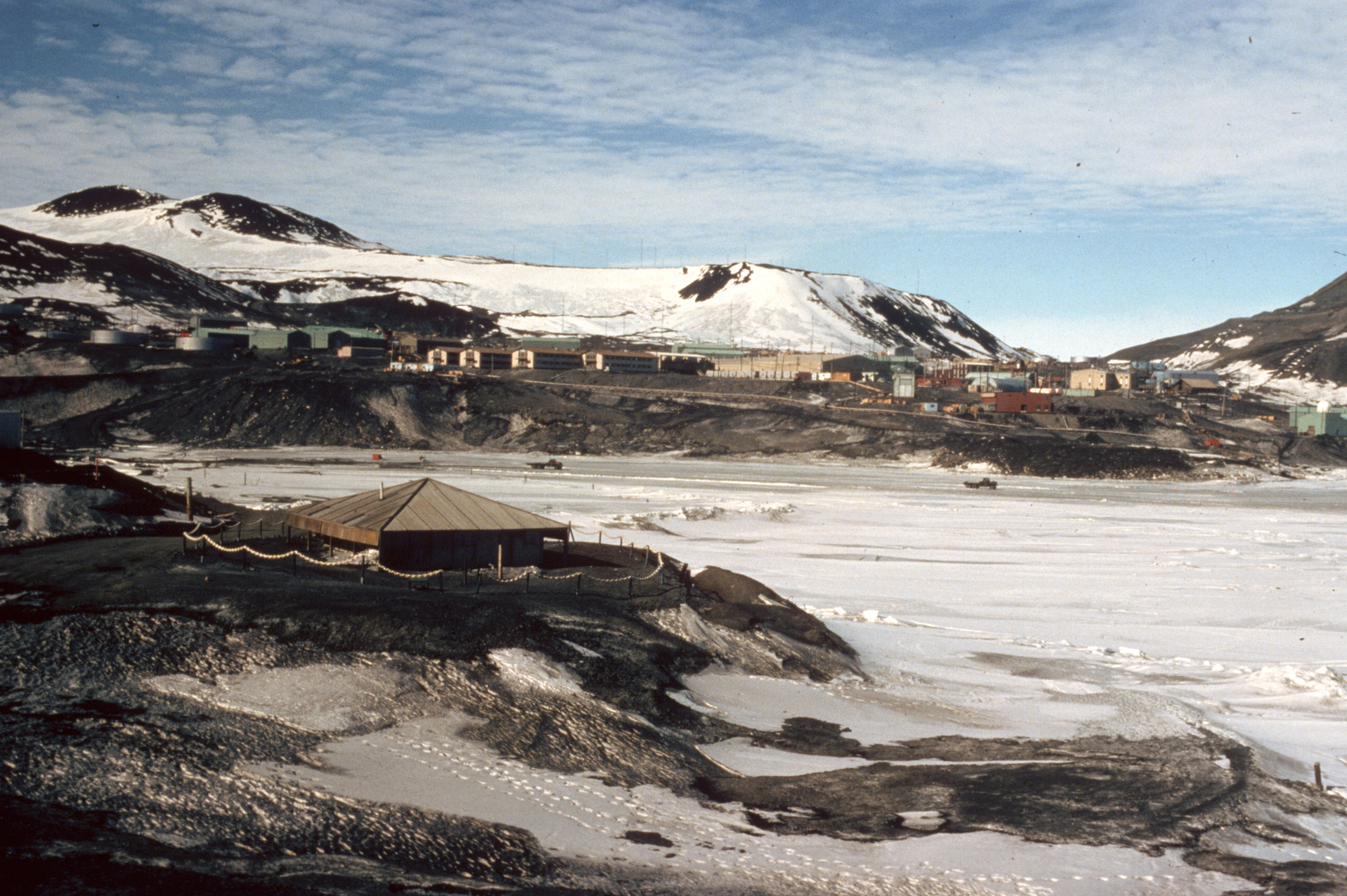 Buildings on a rocky coastline.