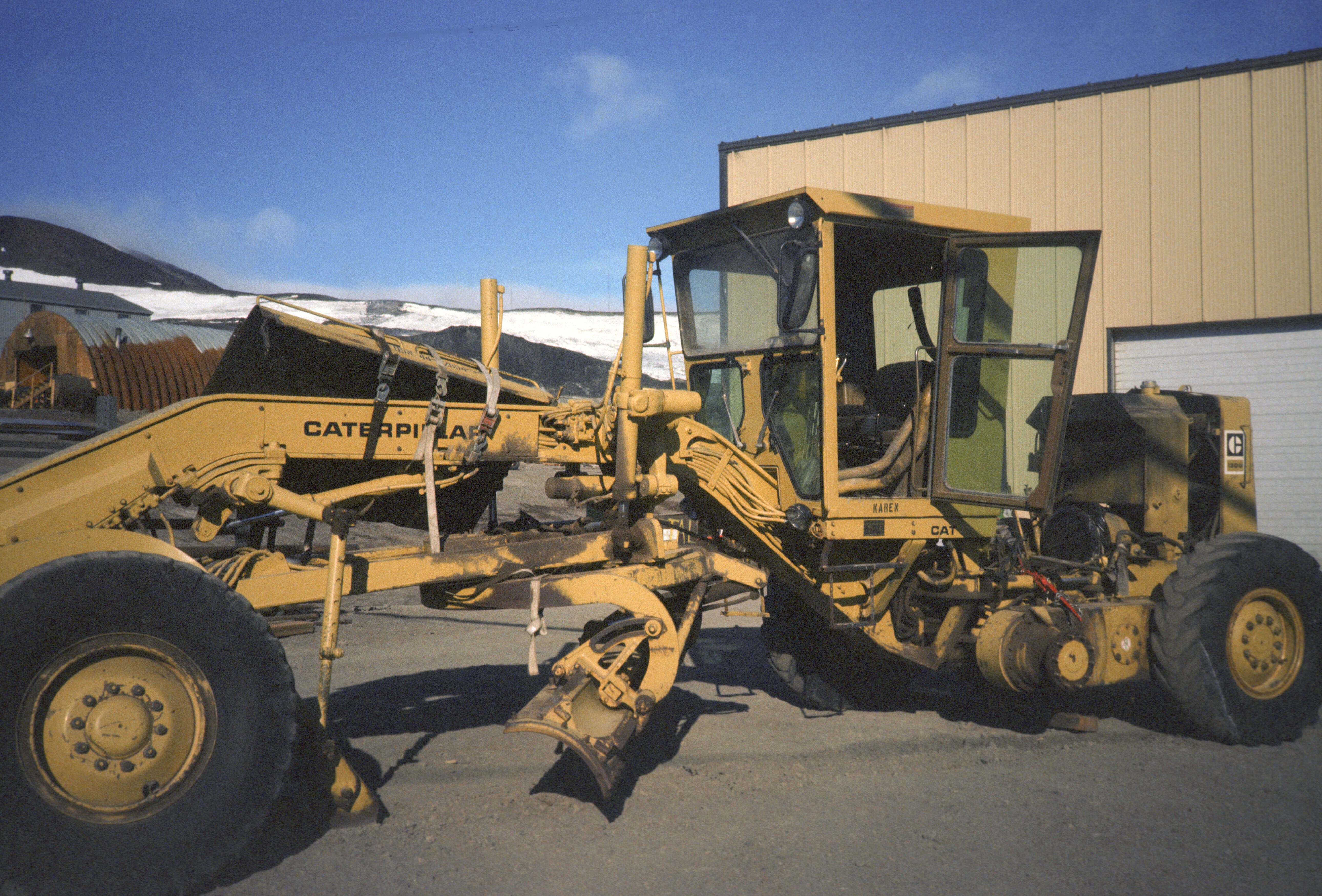 A Caterpillar road grader.