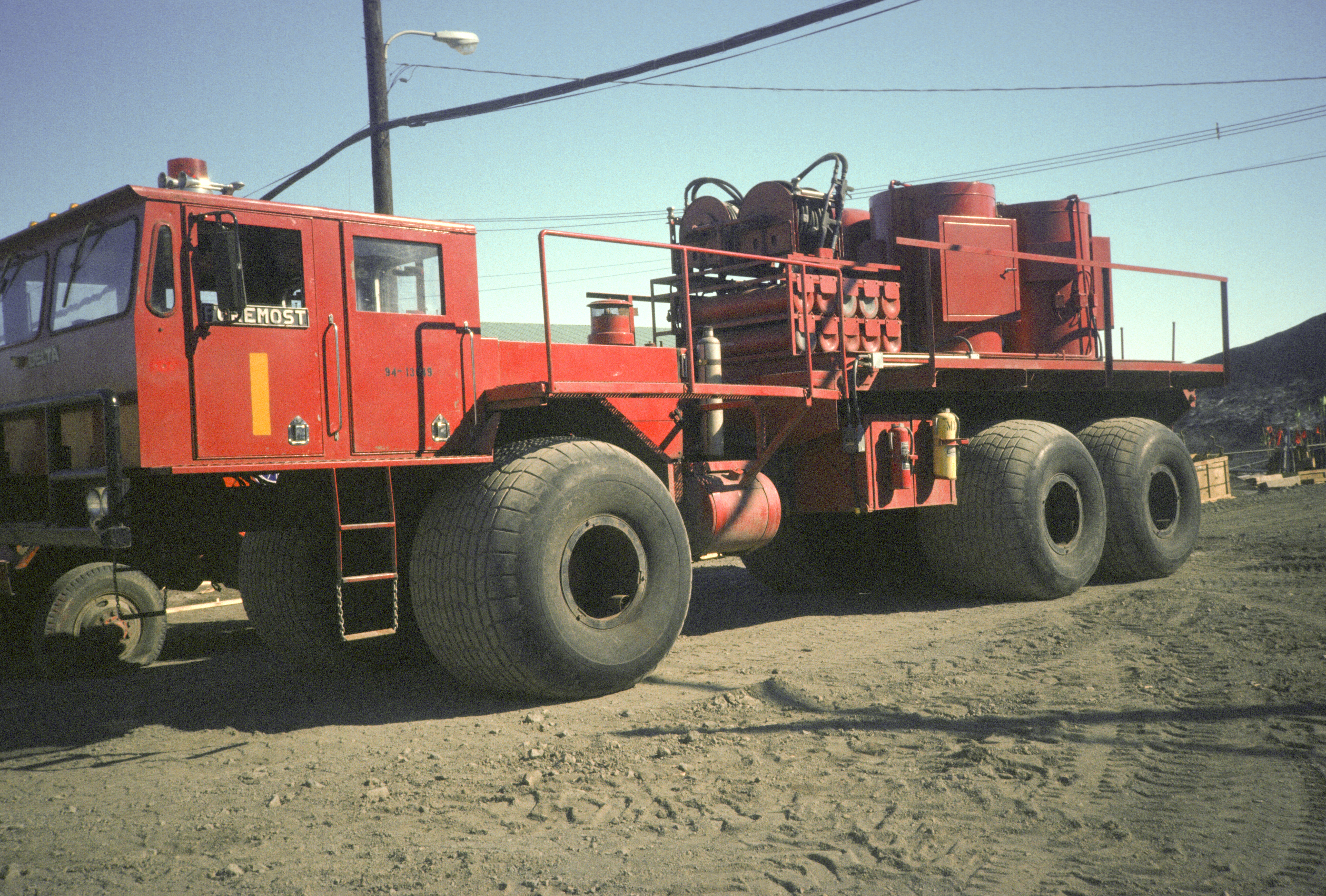 A large red flatbed truck.