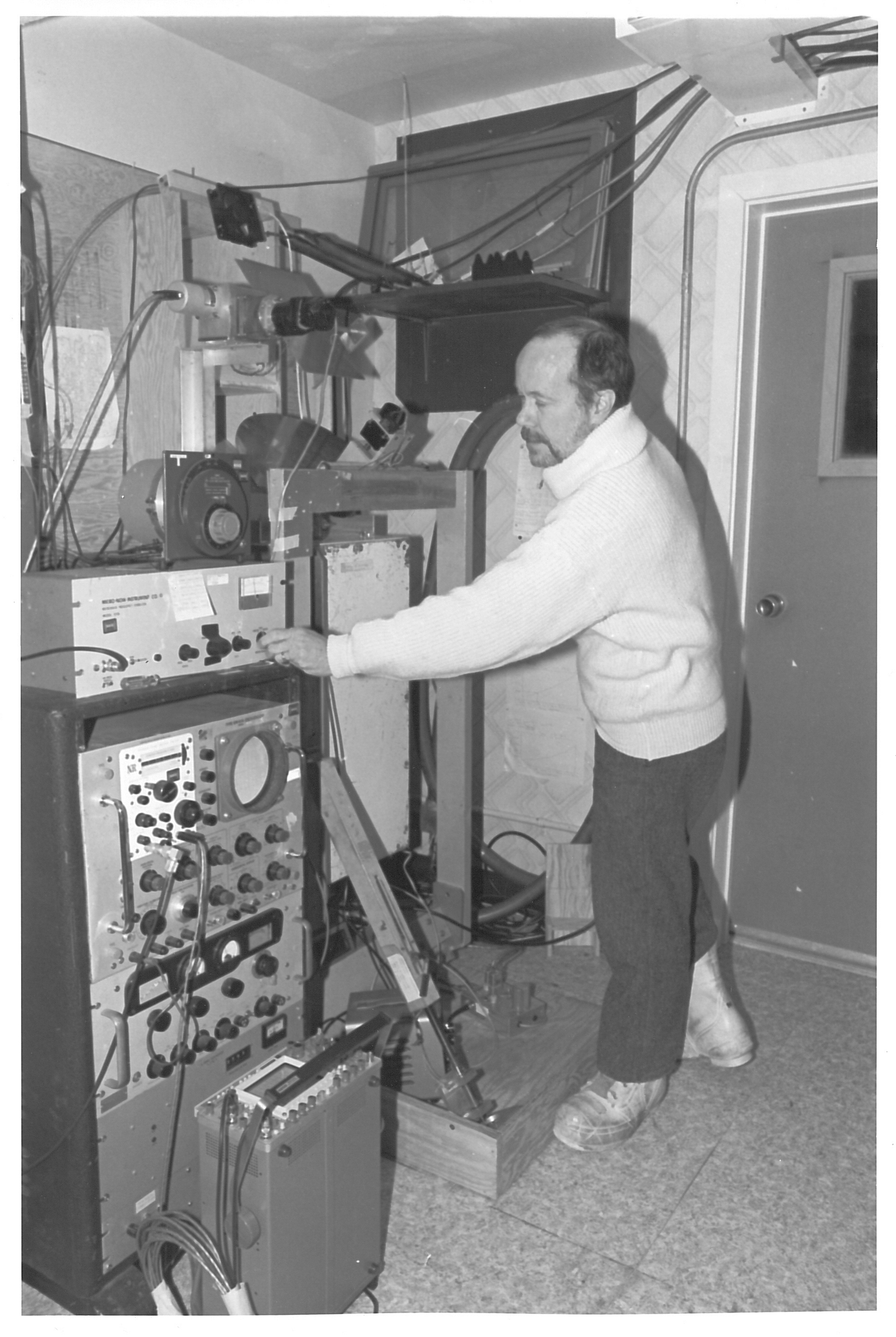 A man working with scientific equipment.