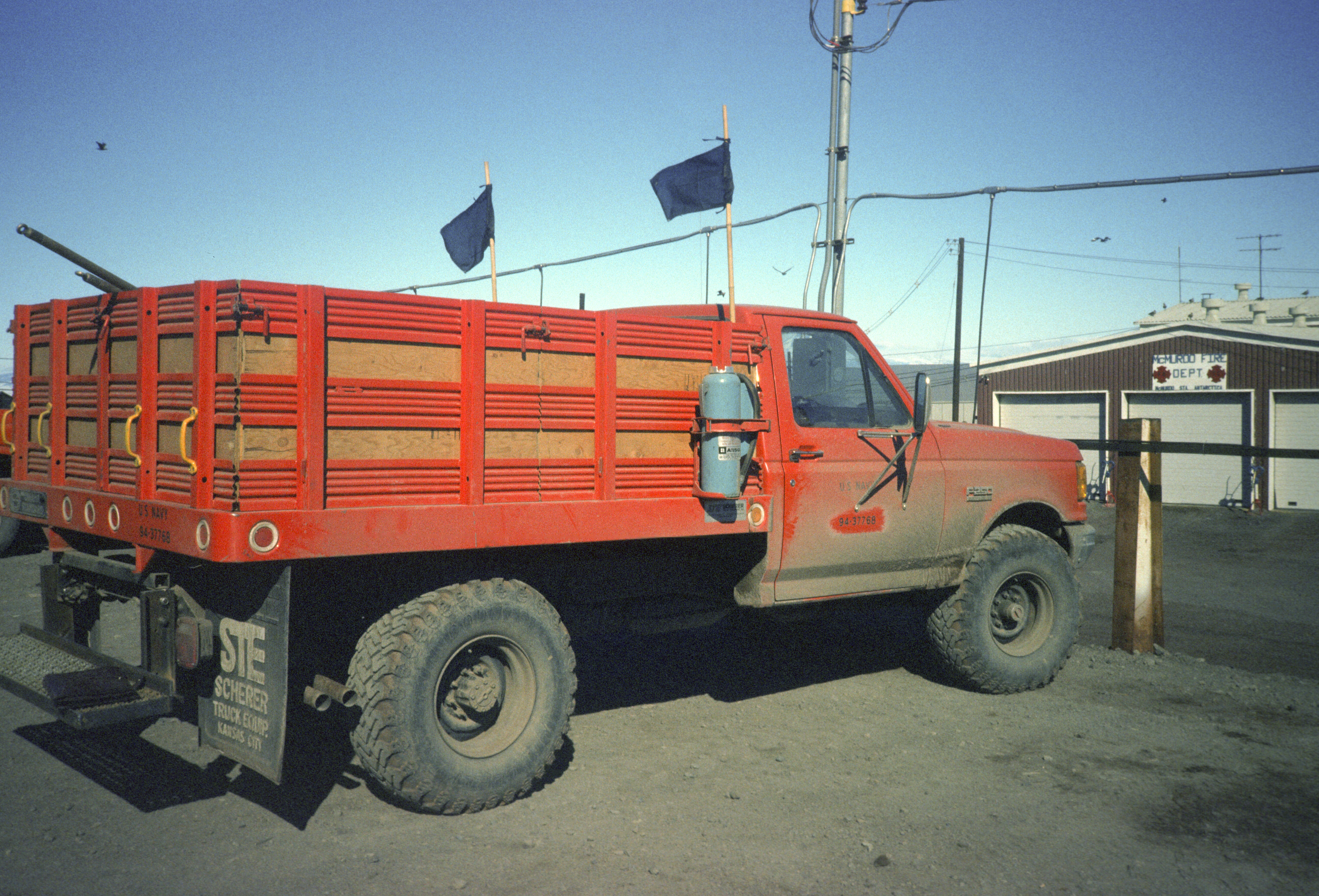 An old orange pickup truck.