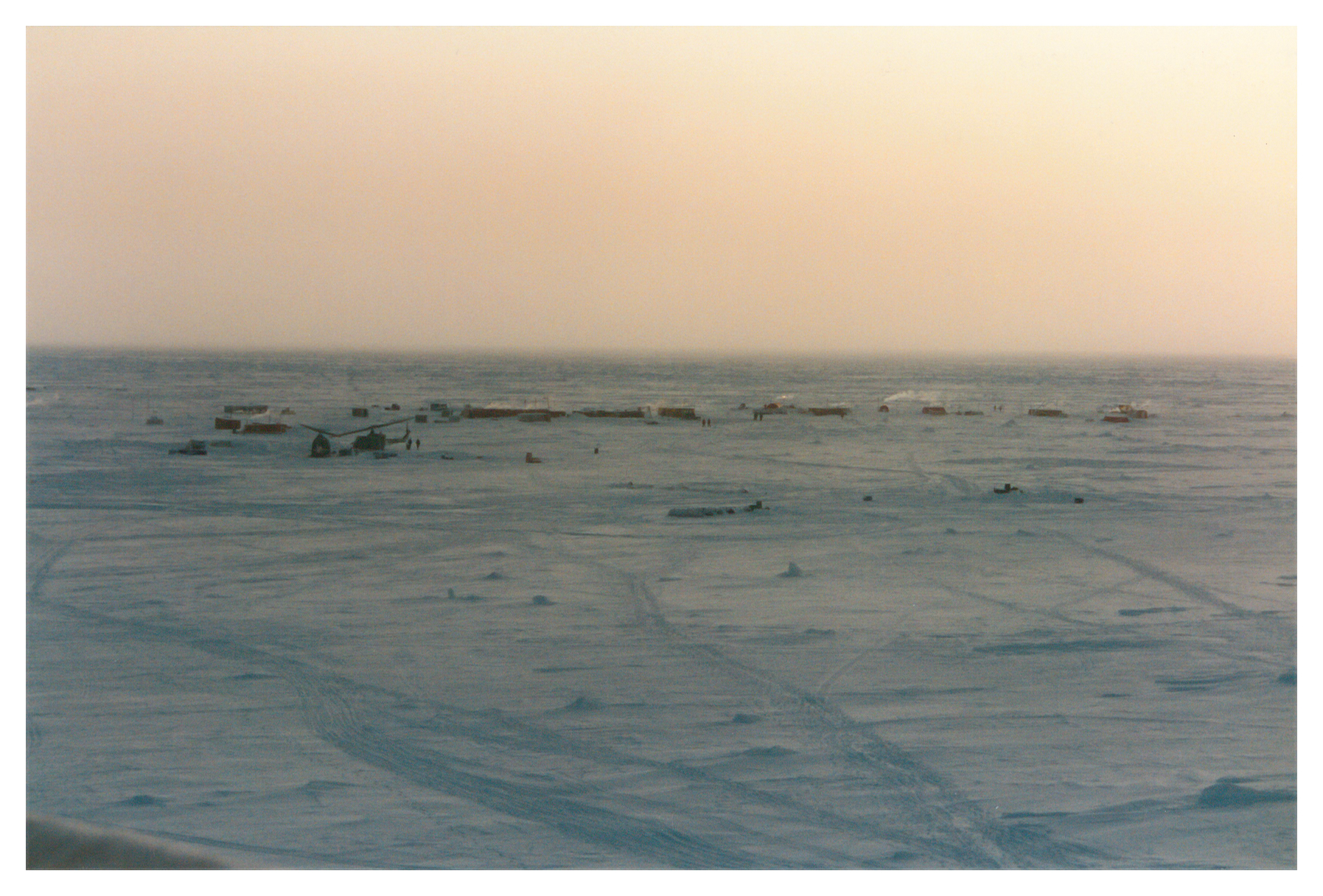 Aerial photo of buildings on snow.