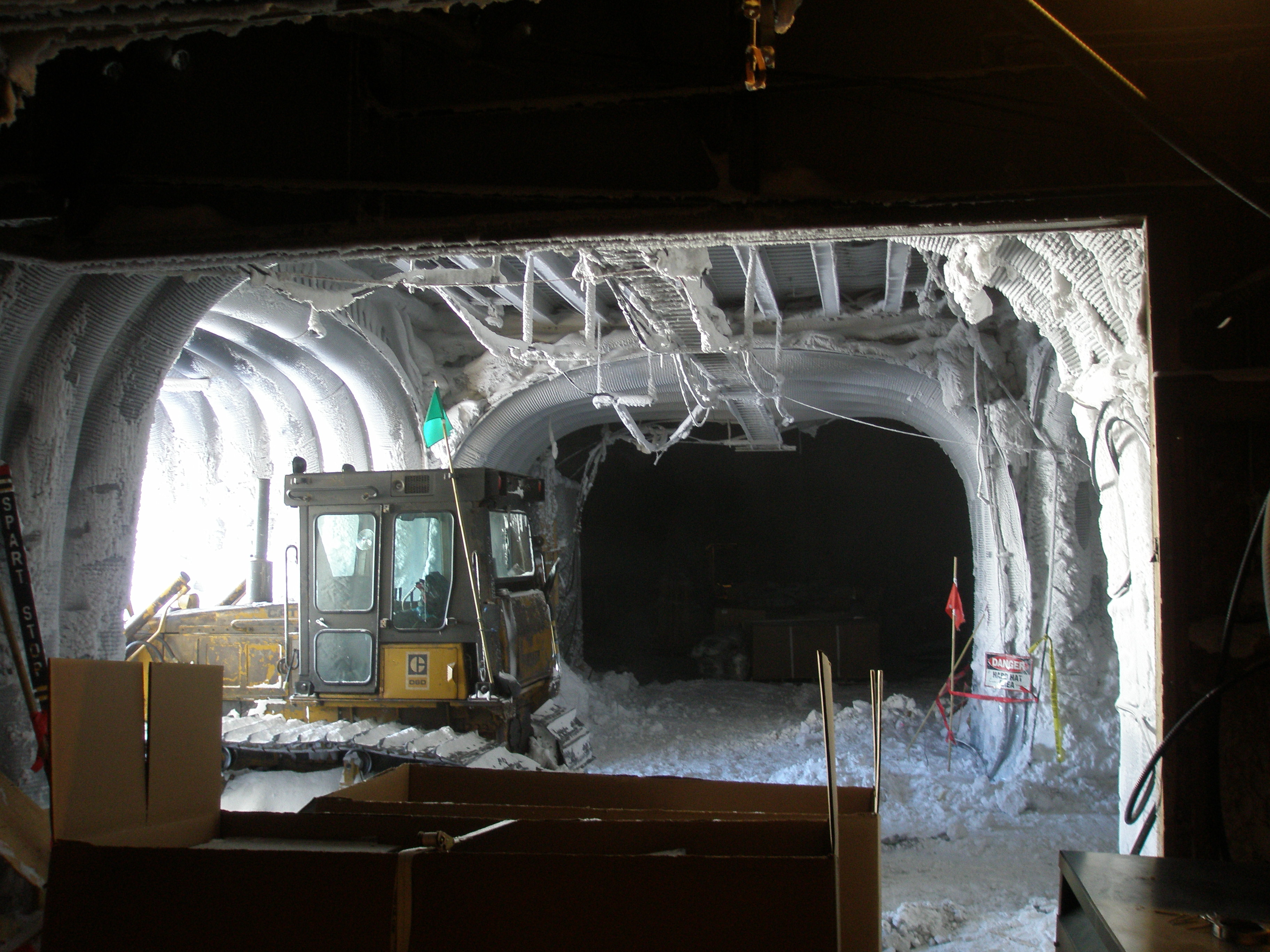 Inside an intersection of two large tunnels.