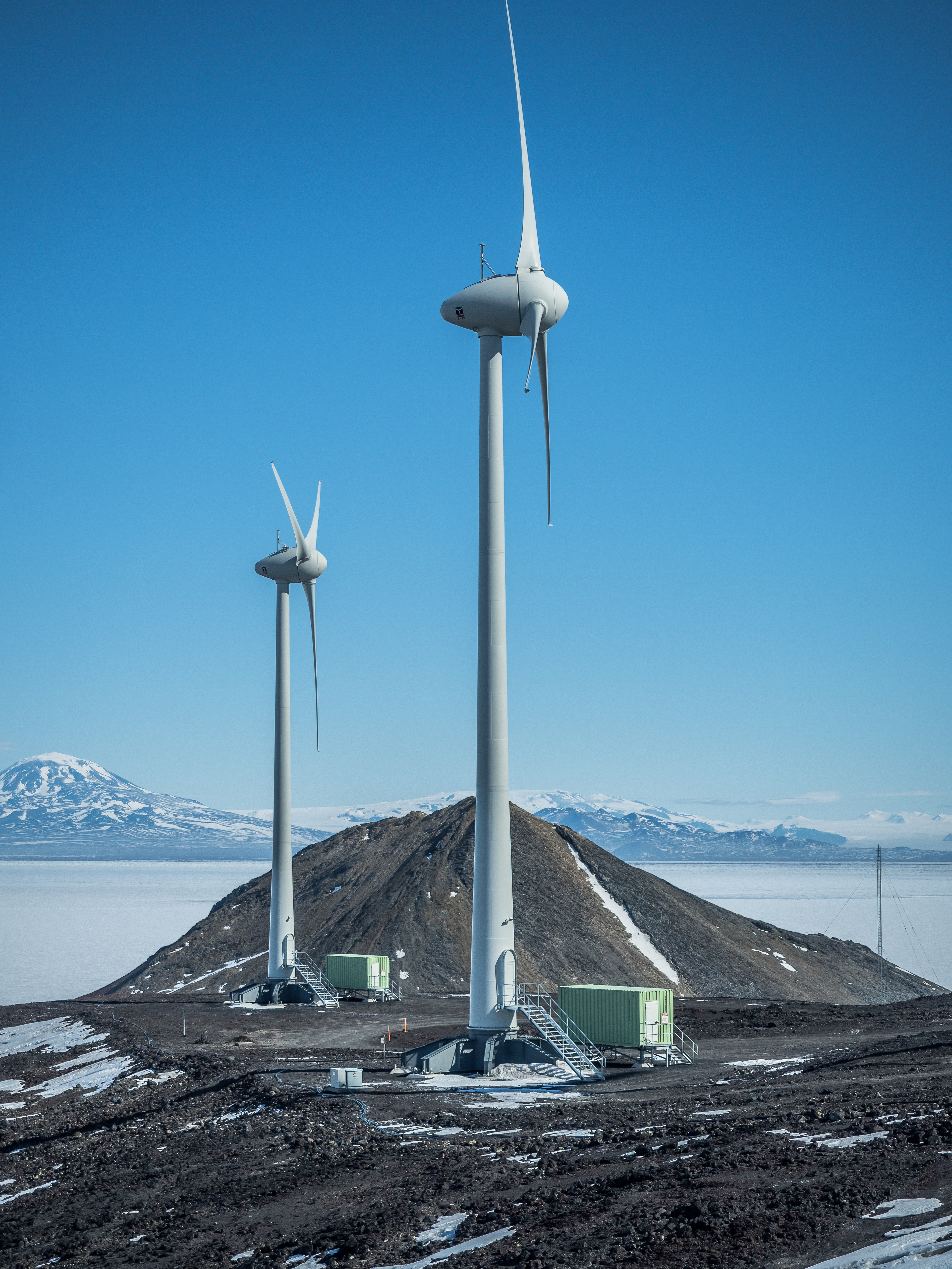 Two wind turbines.