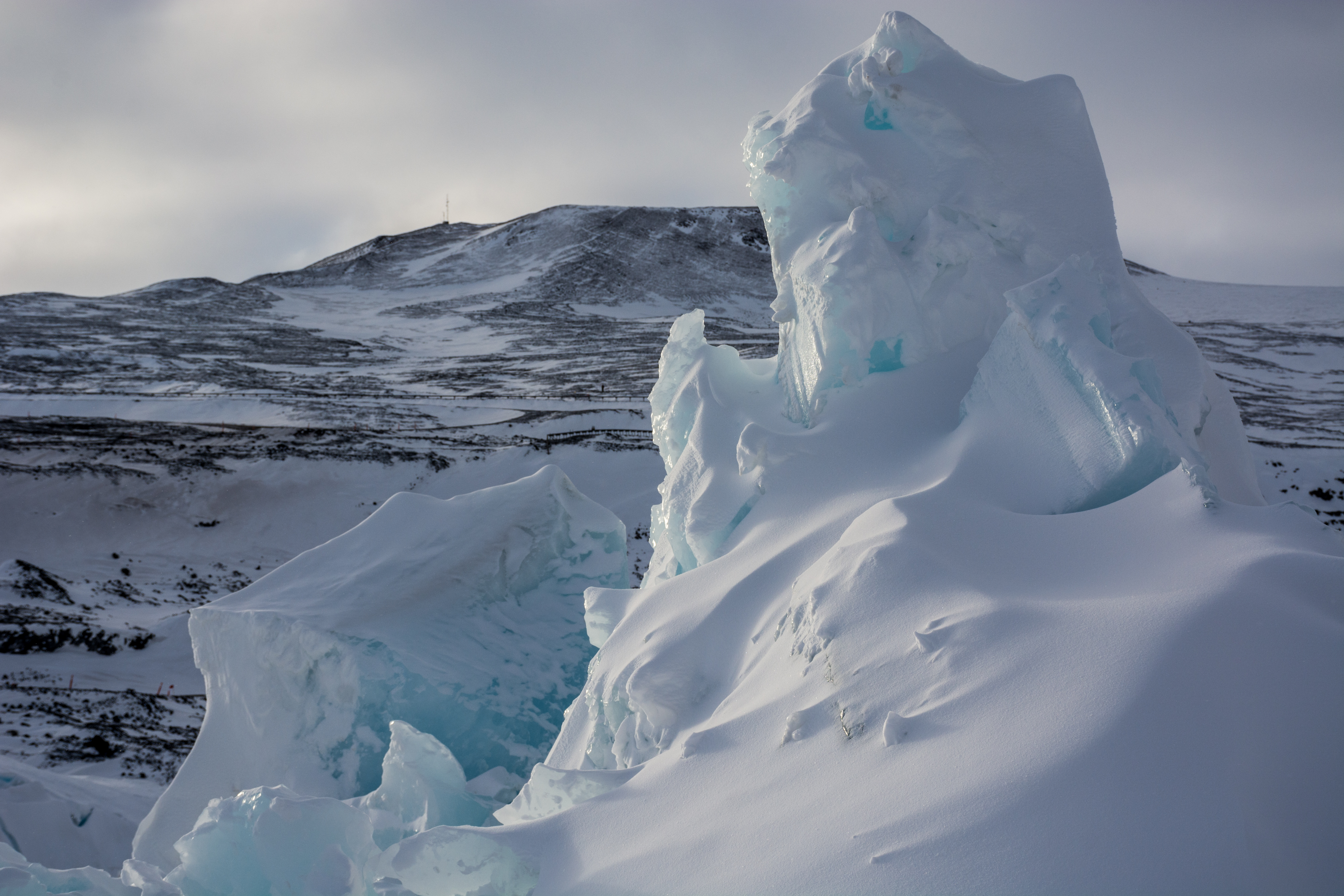 A landscape of snow and ice peaks.