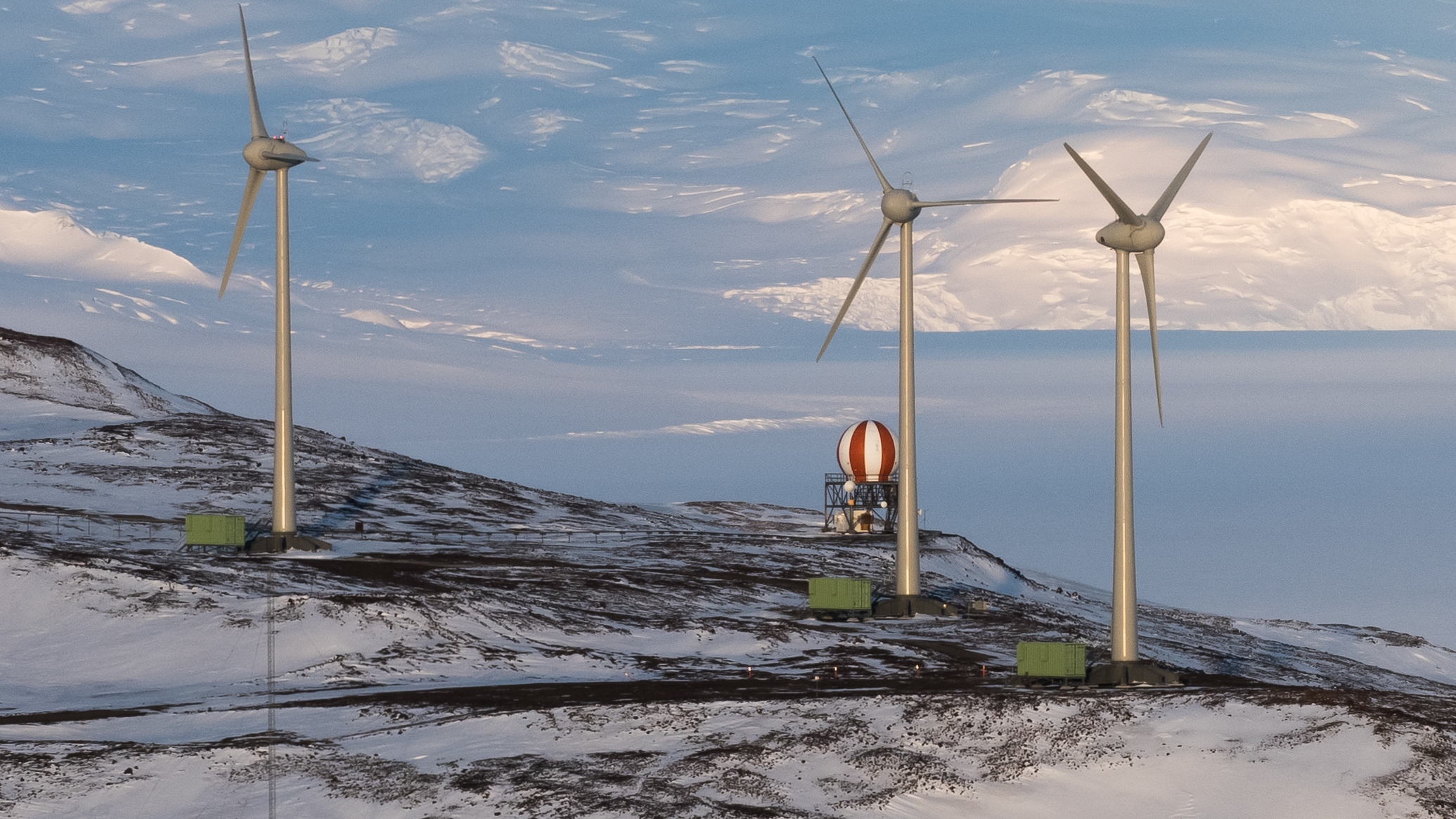 Three wind turbines.