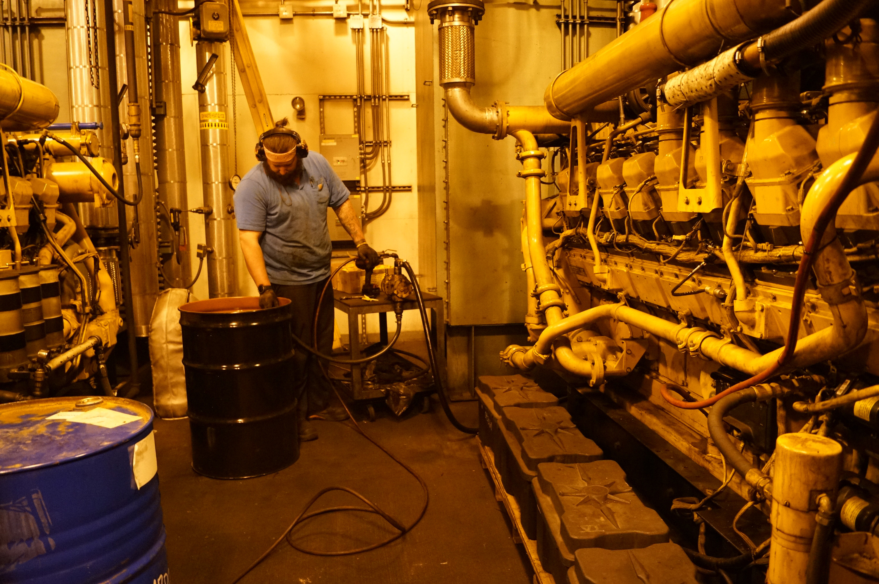 A mechanic works on power plant generators.