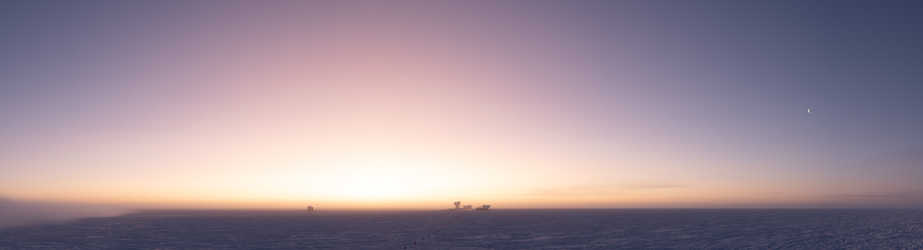 Sunrise over a frozen landscape.