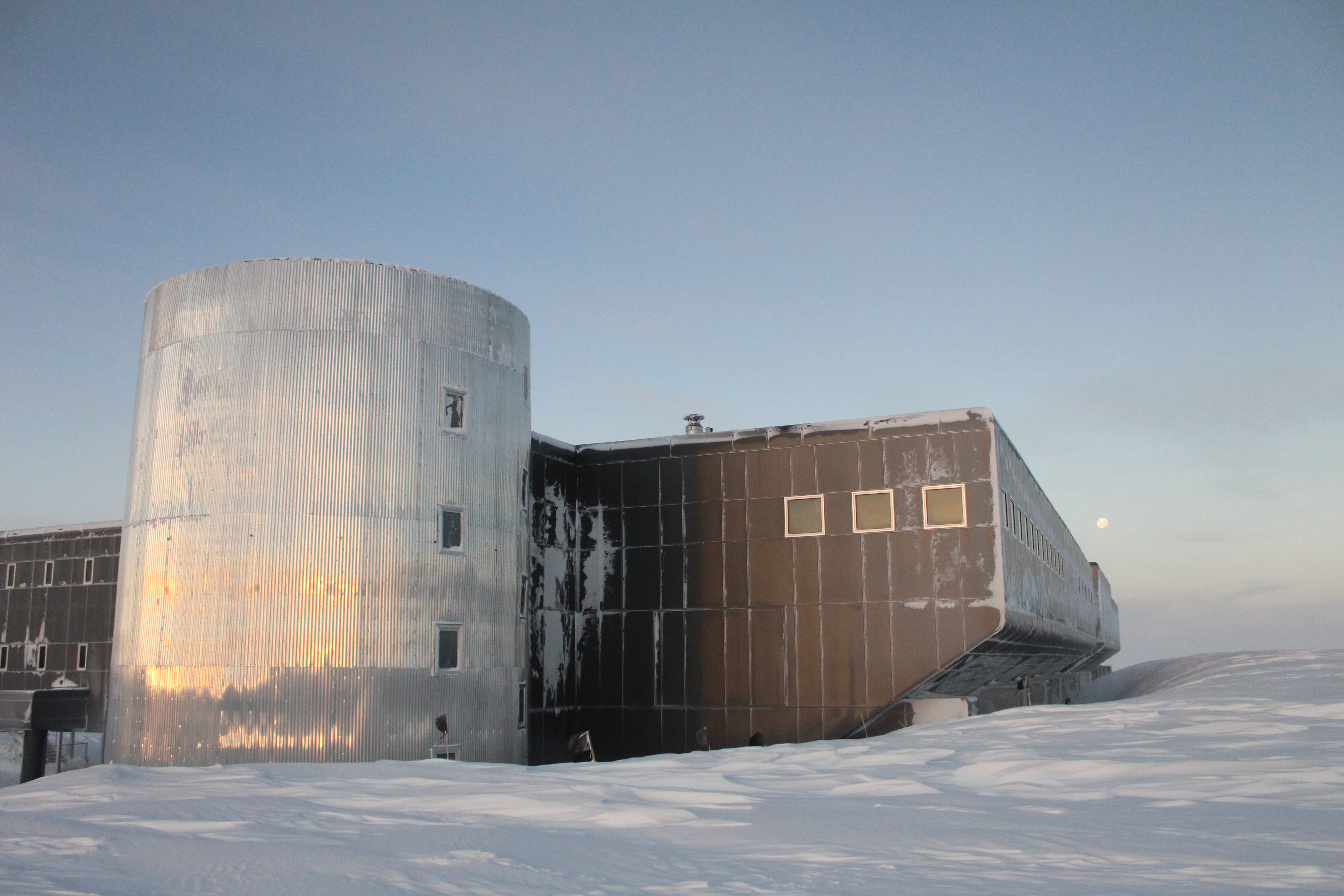 A building on a frozen landscape.