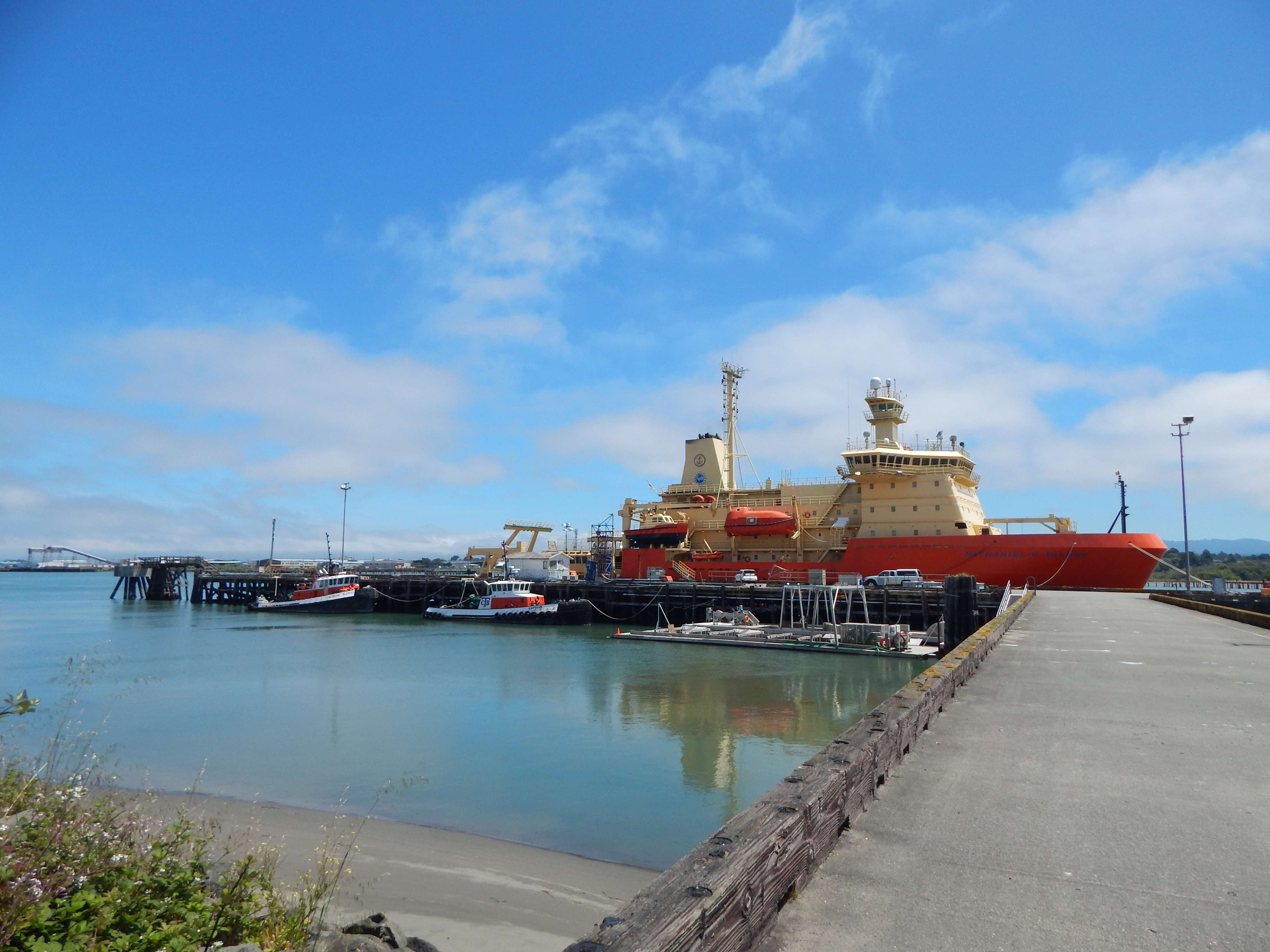 A ship at a pier.