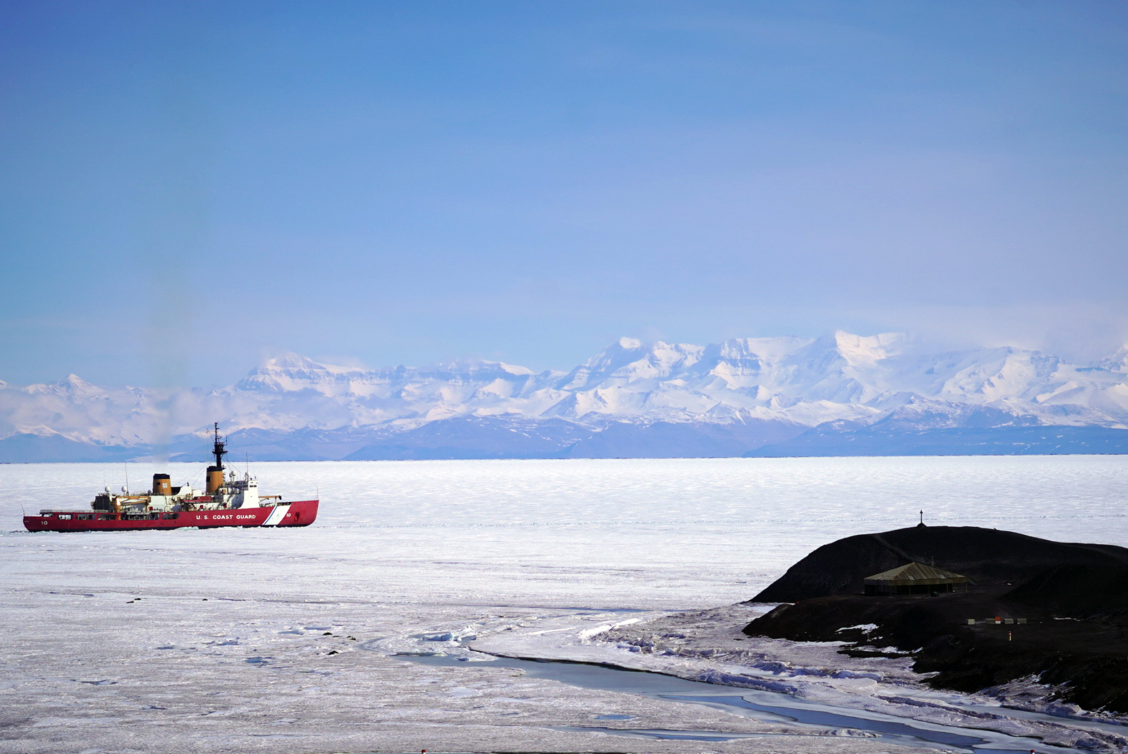An icebreaker ship in the ocean.