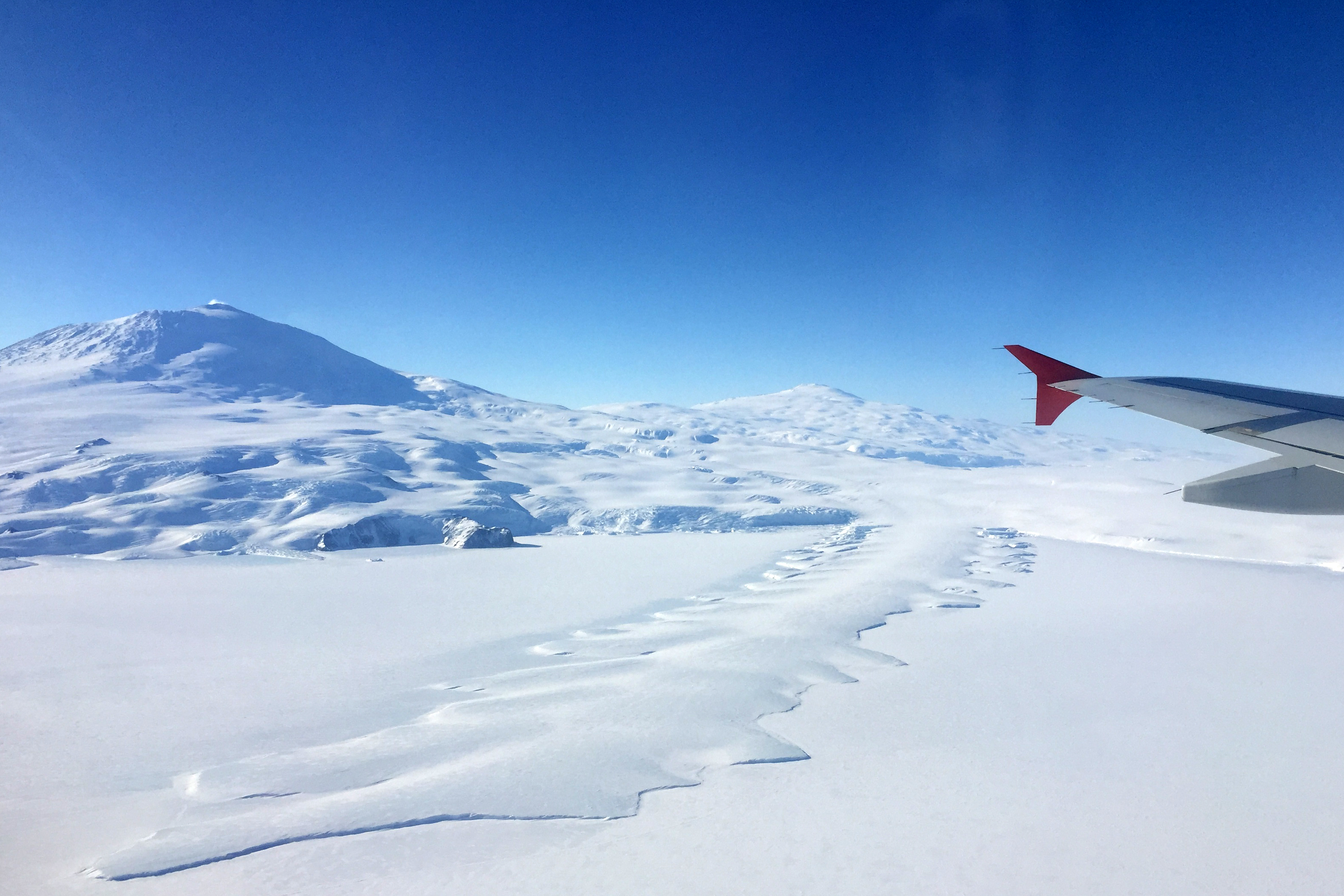 Aerial view of snow covered landscape.