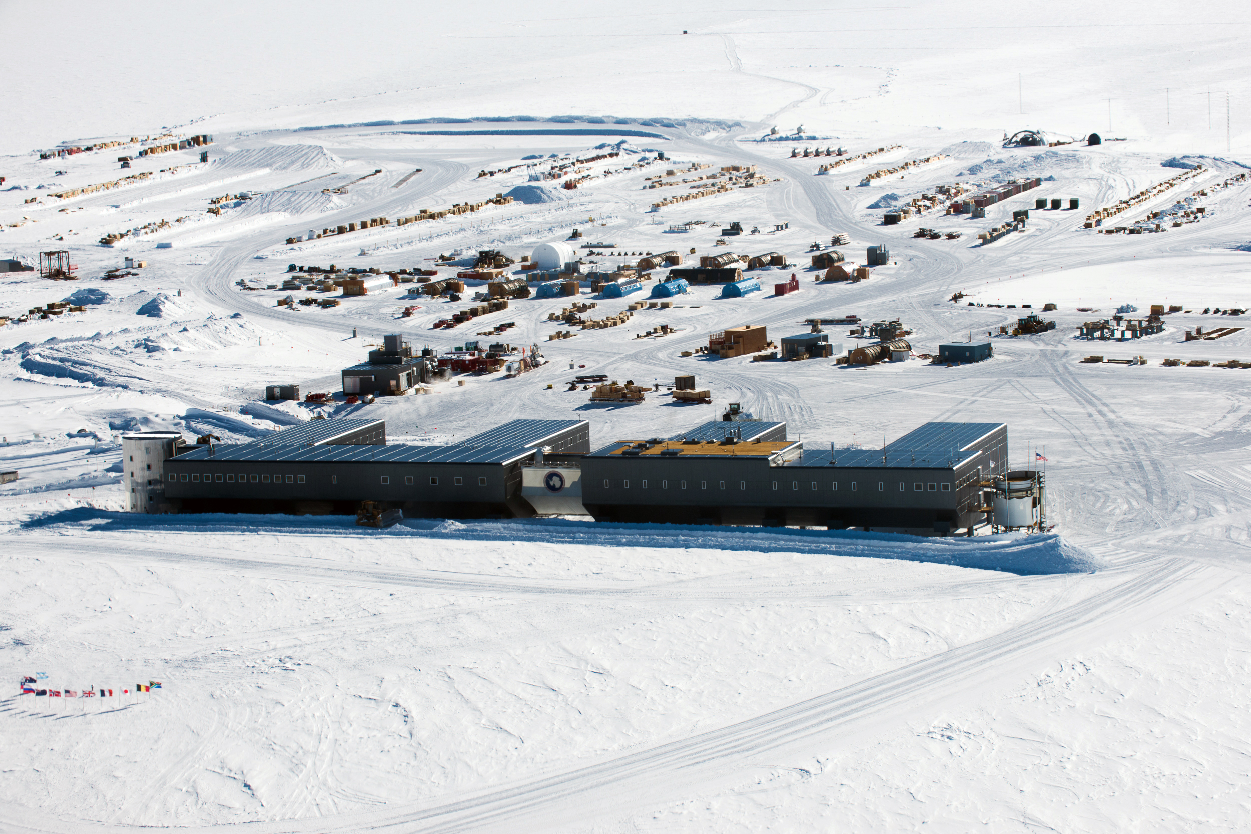 Aerial view of buildings on snow.