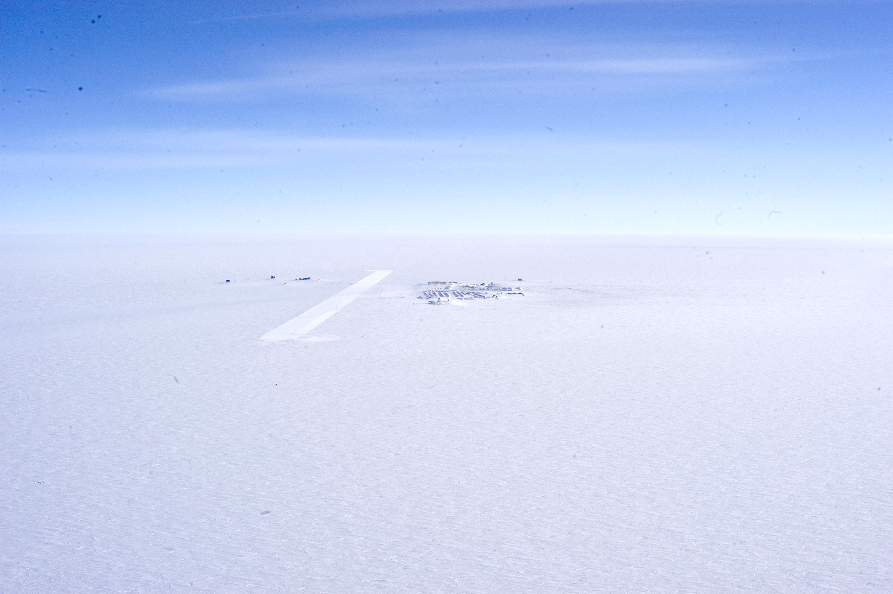 Aerial of buildings on snow.