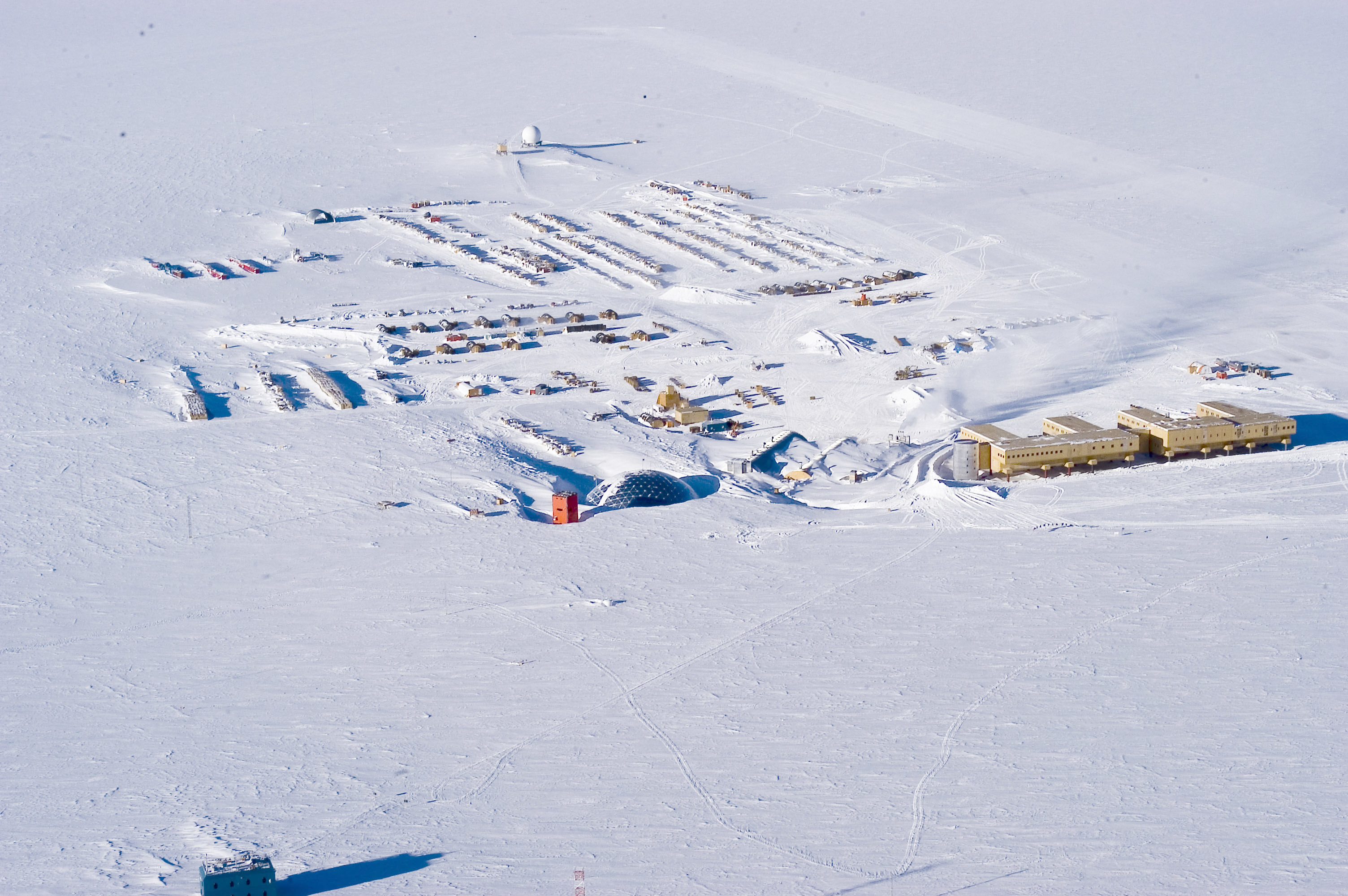 Aerial of buildings on snow.