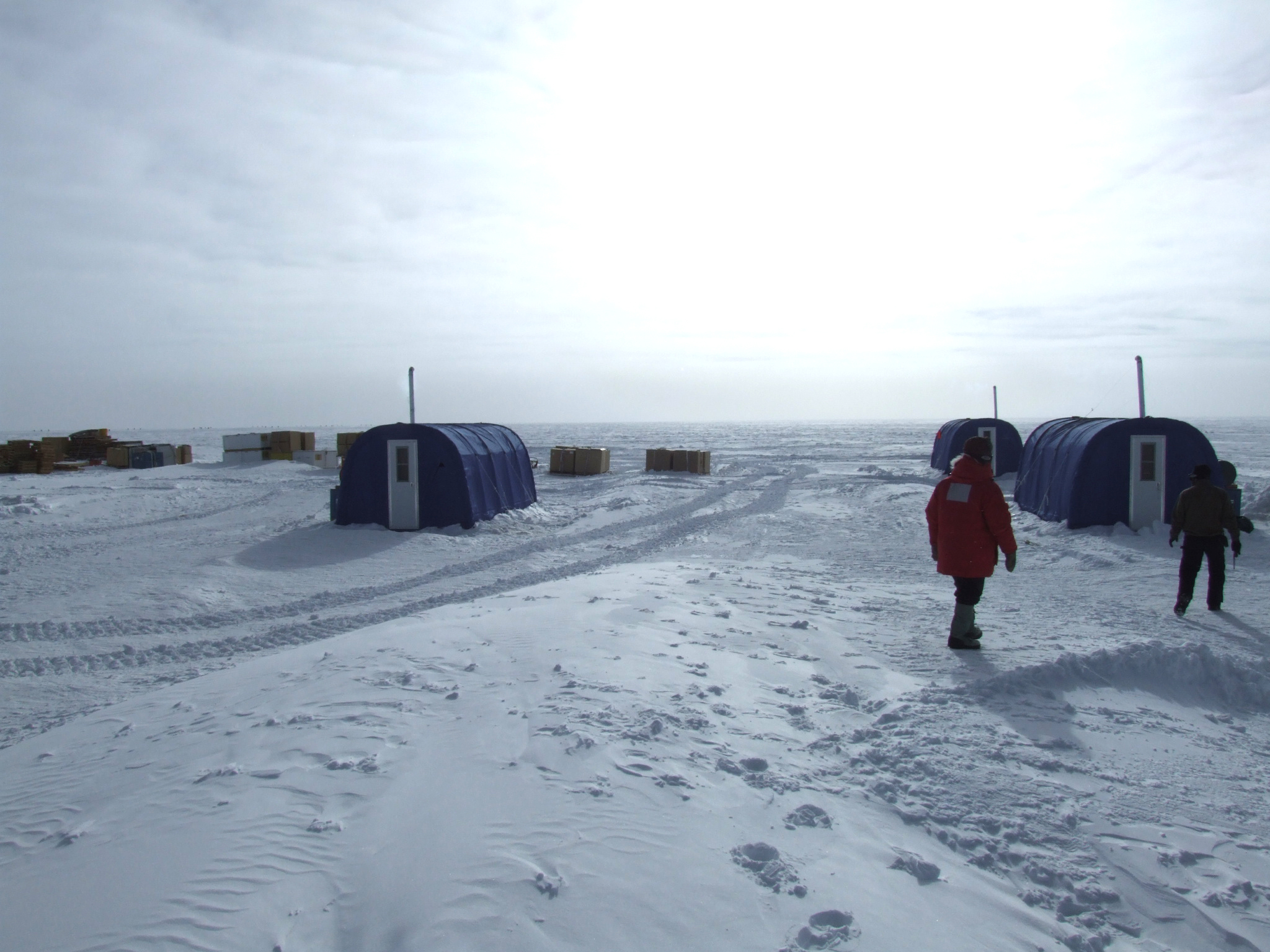 Portable buildings on snow.