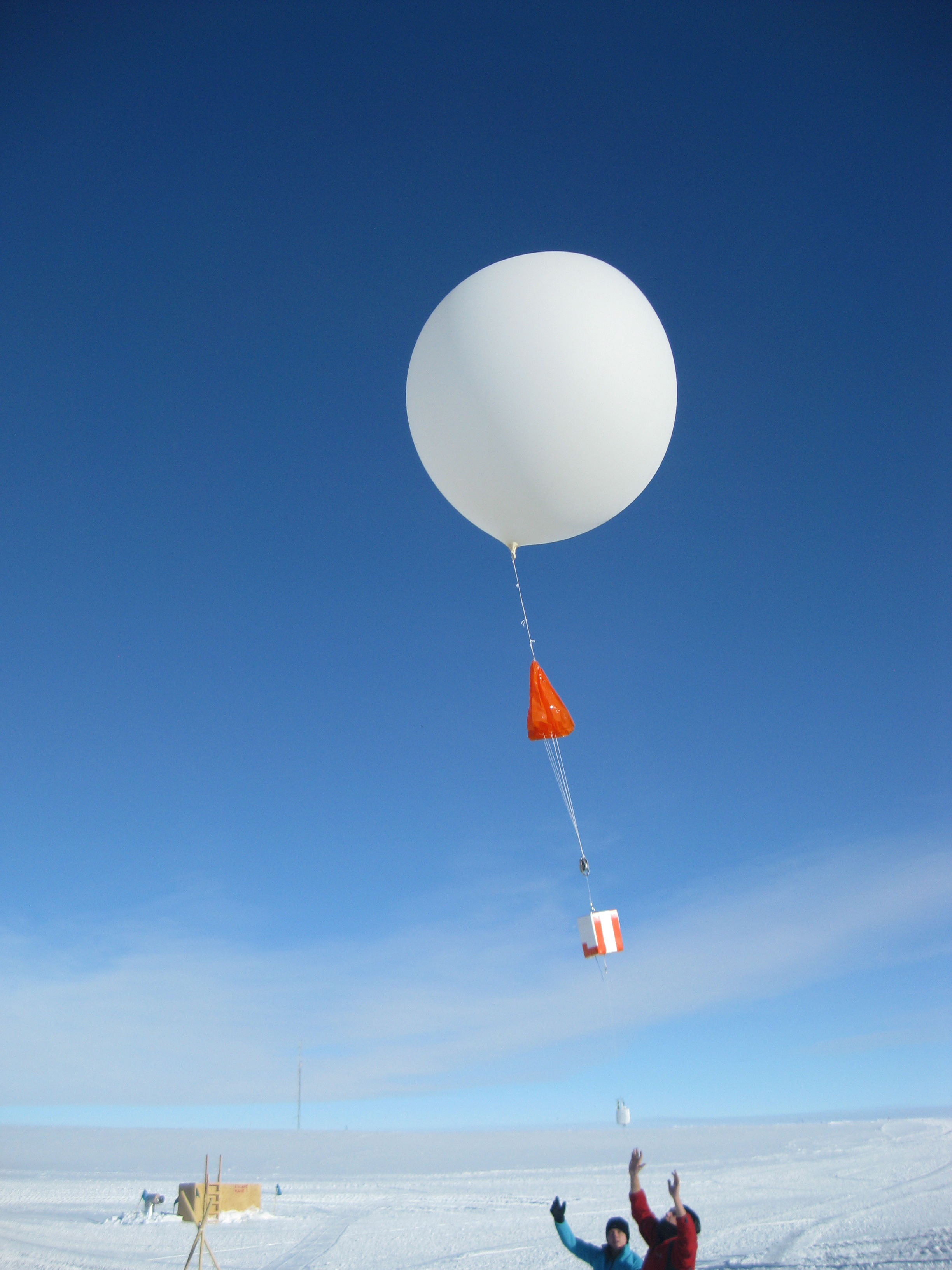 A weather balloon being launched.