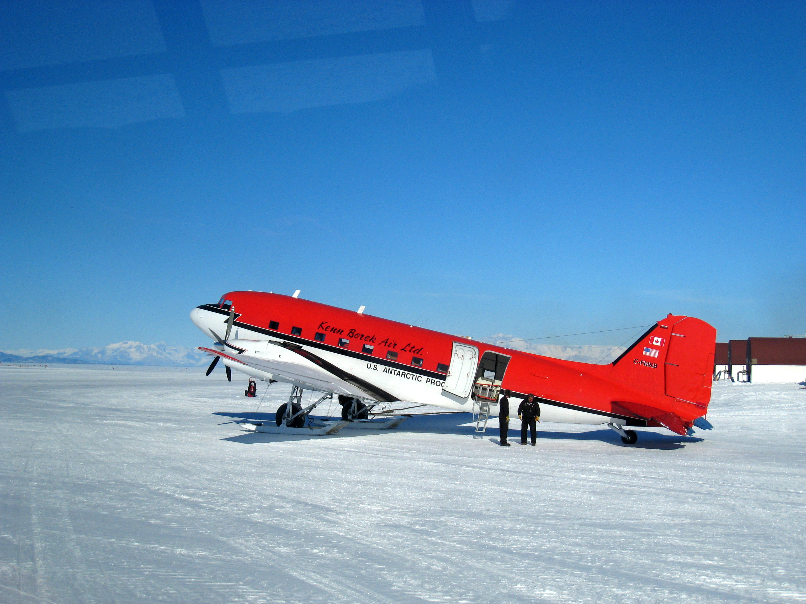 An airplane sits on the ground.