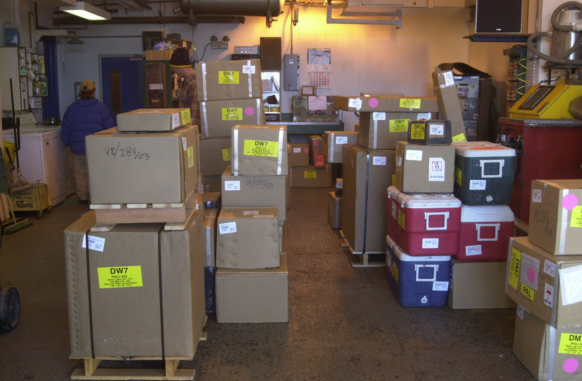 Piles of boxes and ice chests.