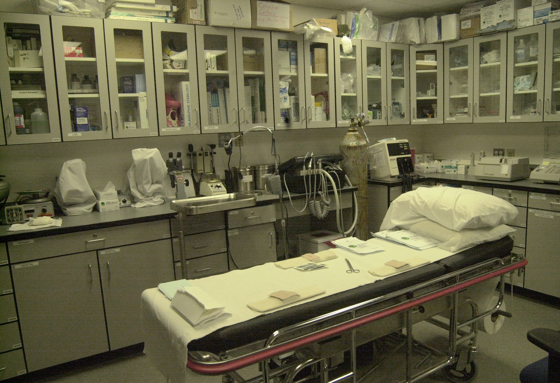 Hospital bed in clinic room.