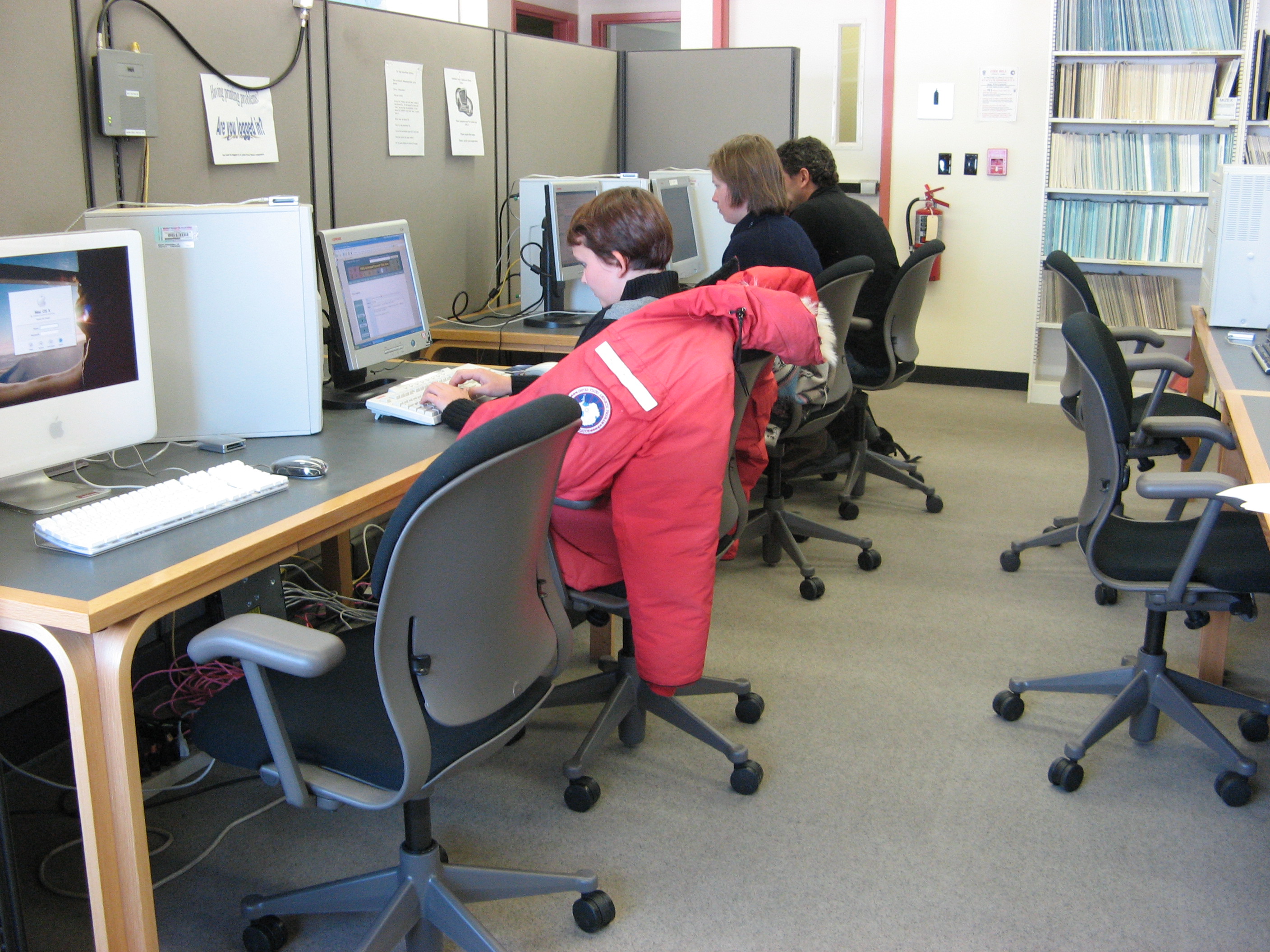 People sitting at computers.