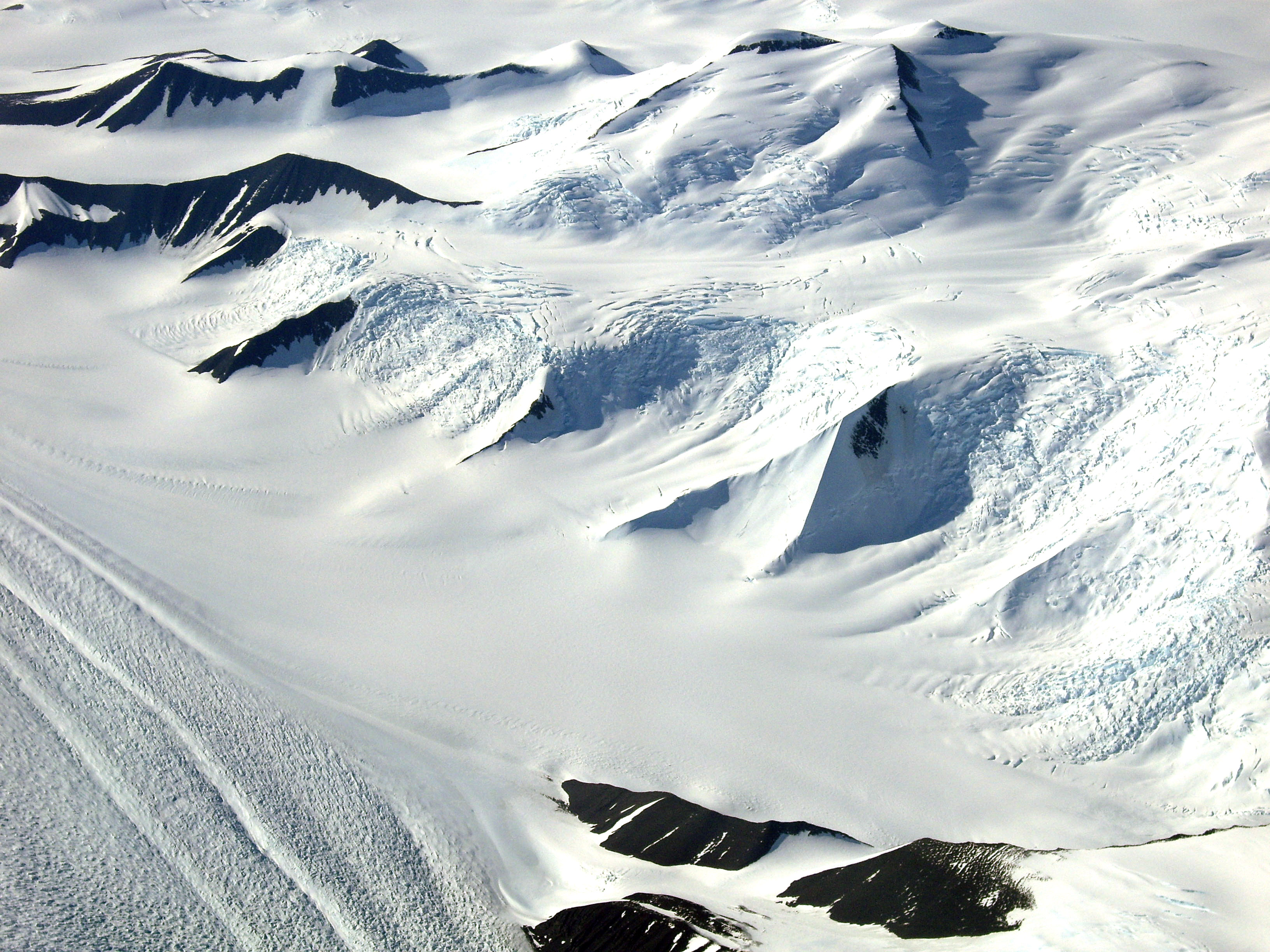 Aerial view of mountains and glaciers.