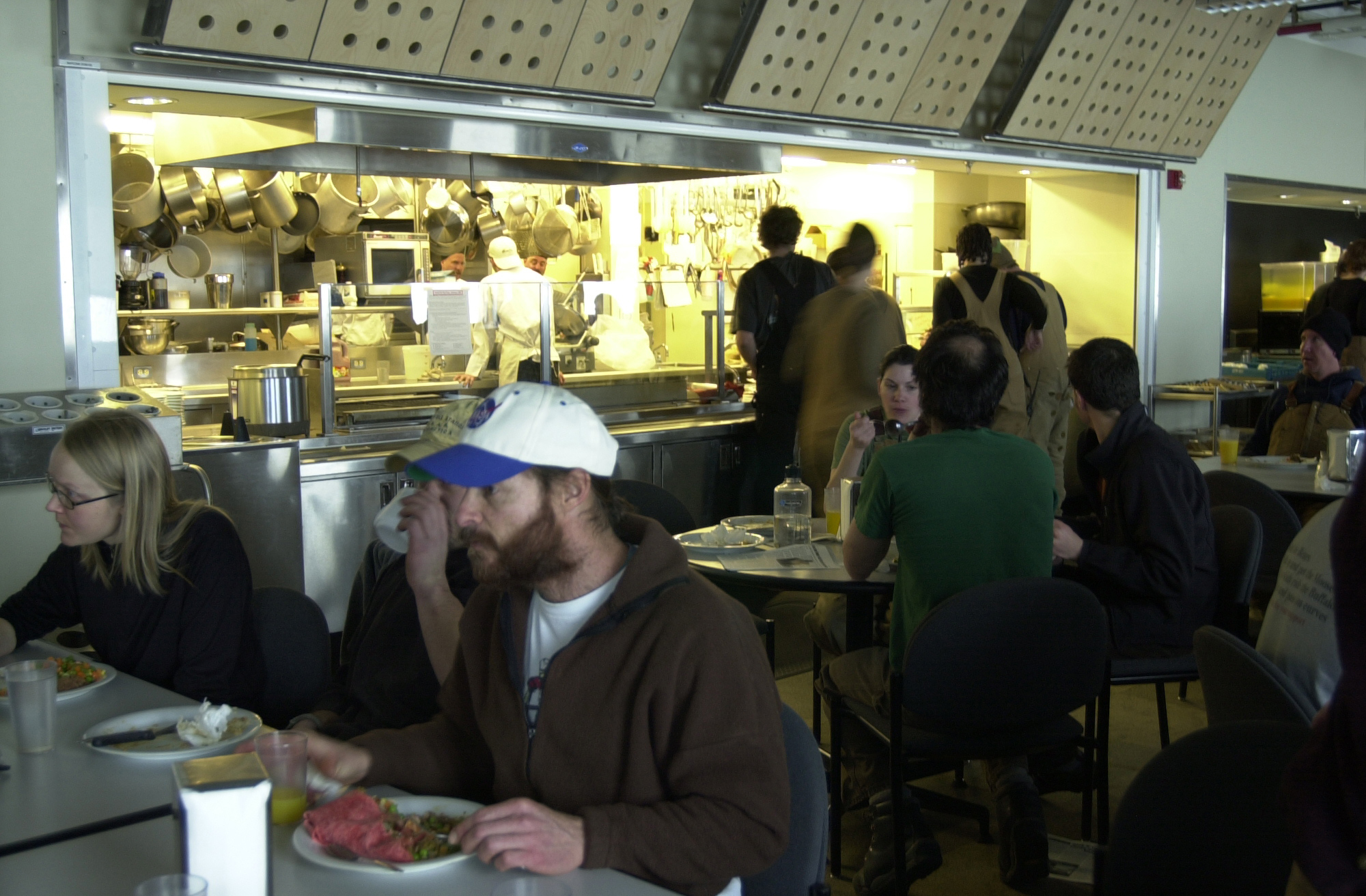 People eat in a cafeteria at the South Pole.