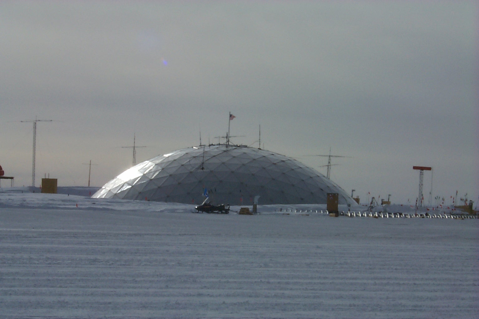 An enormous silver dome surrounded by snow.