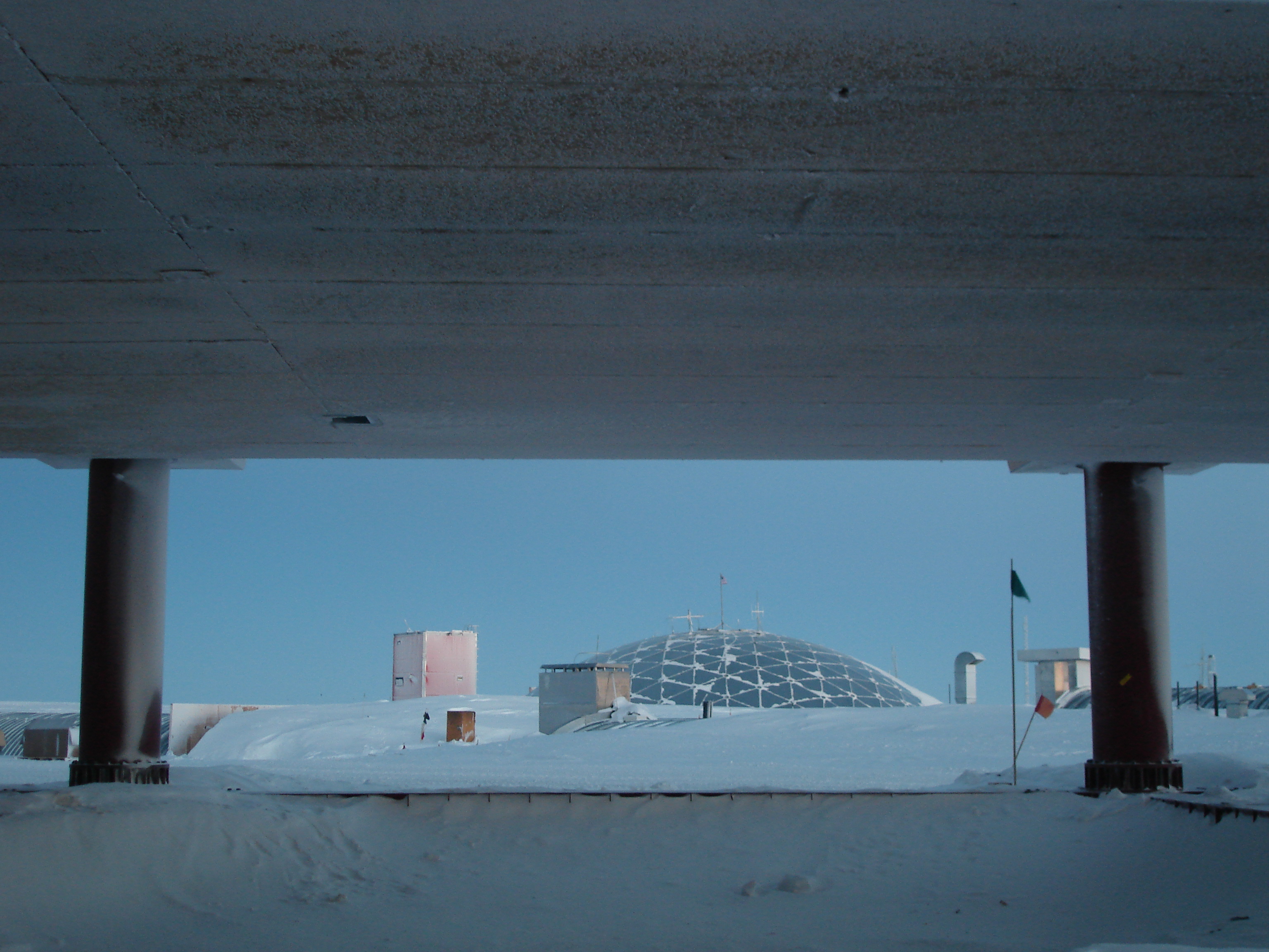 The view from under a building.