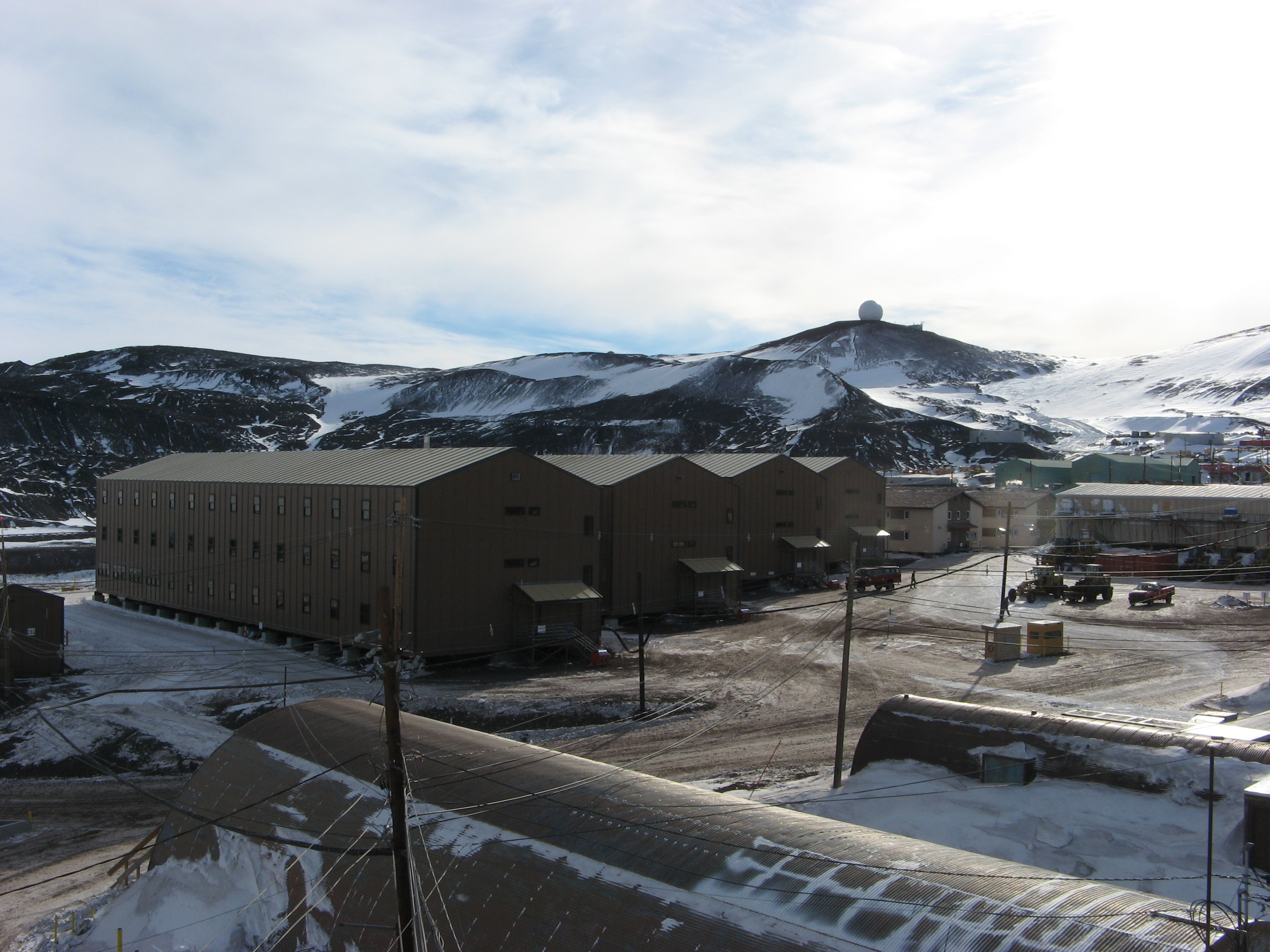 Several buildings stand in a row.