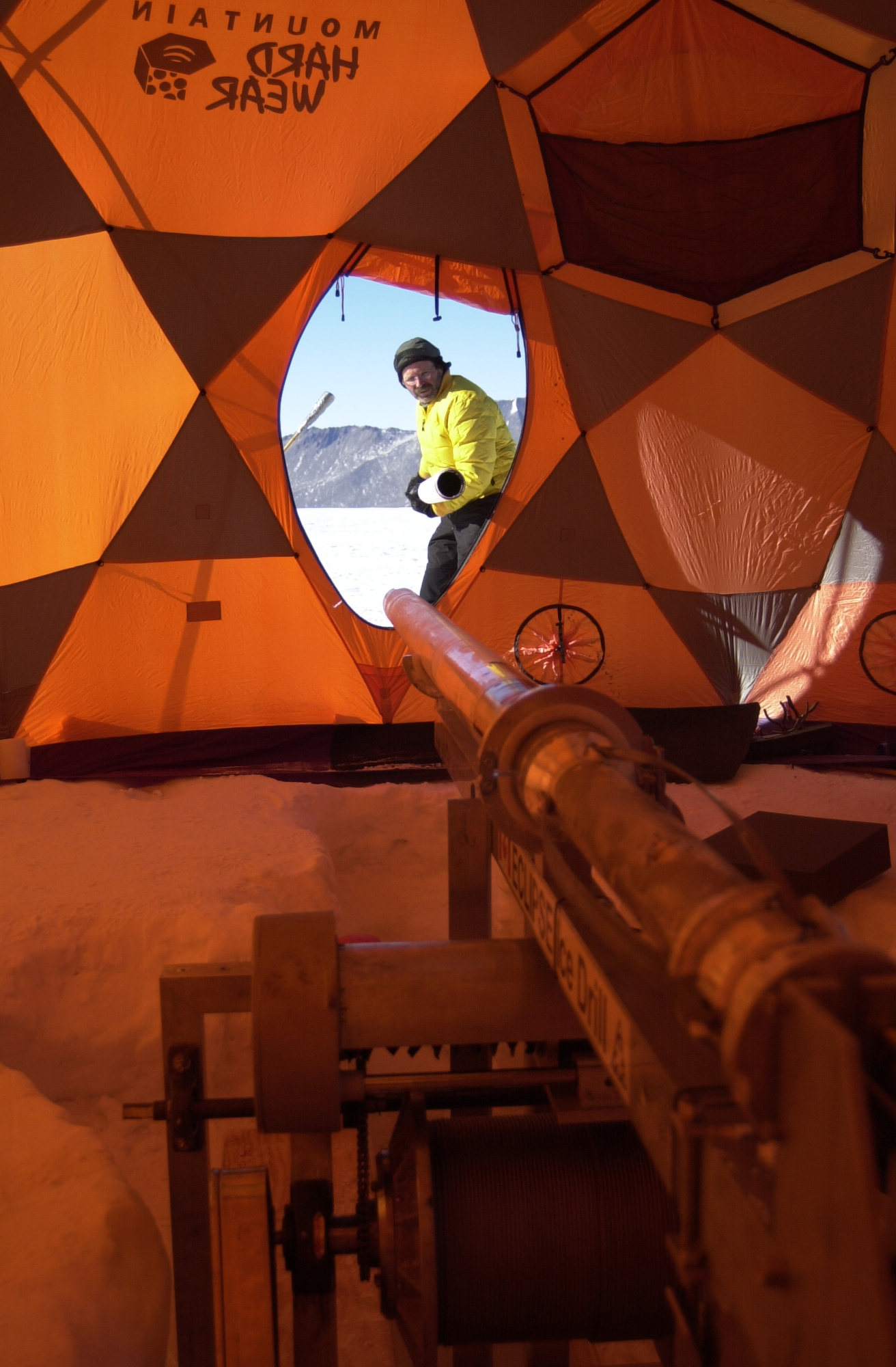 A view from inside a tent looking out.