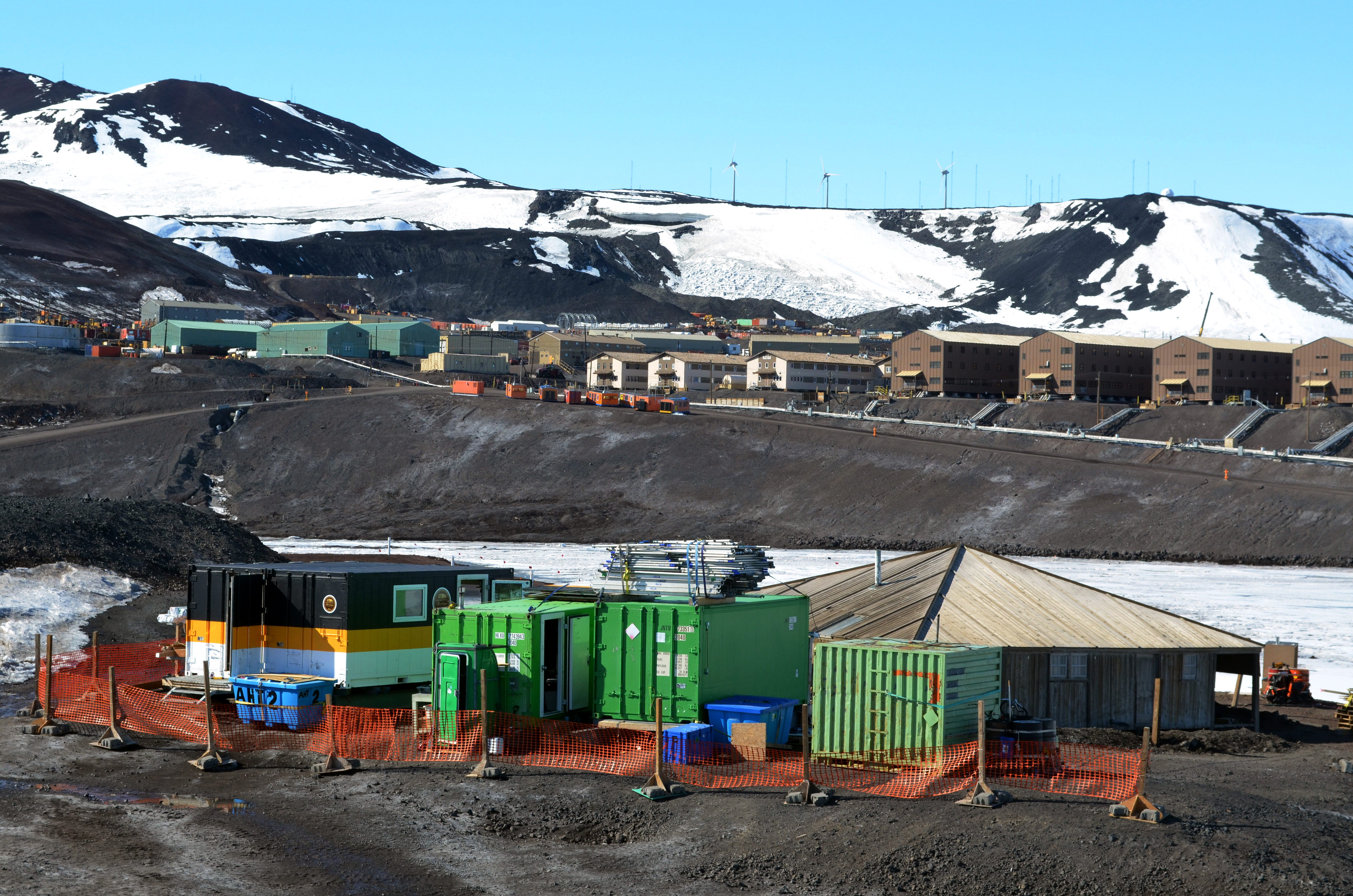 Construction site sits in front of small town.