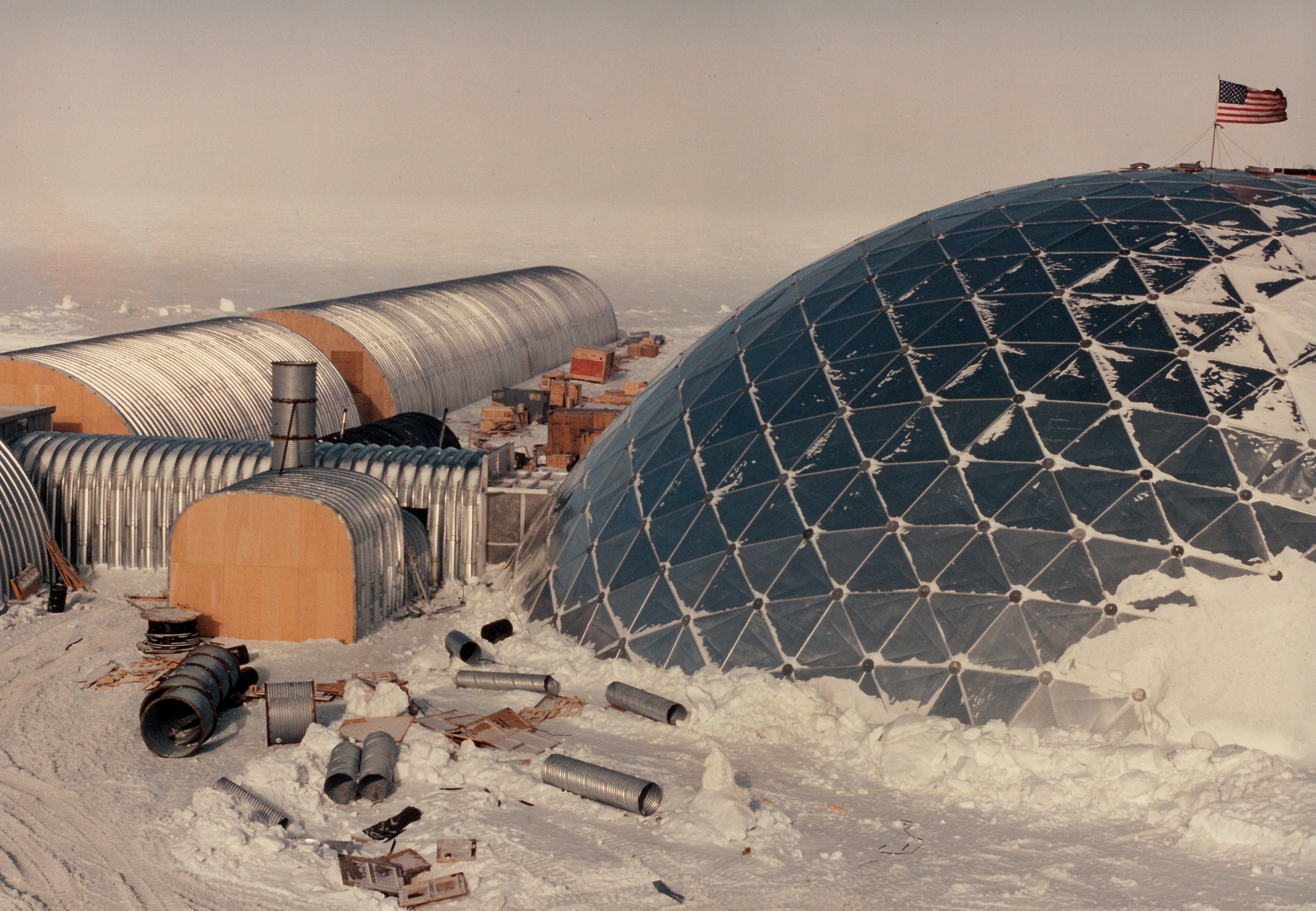 Metal buildings on snow.