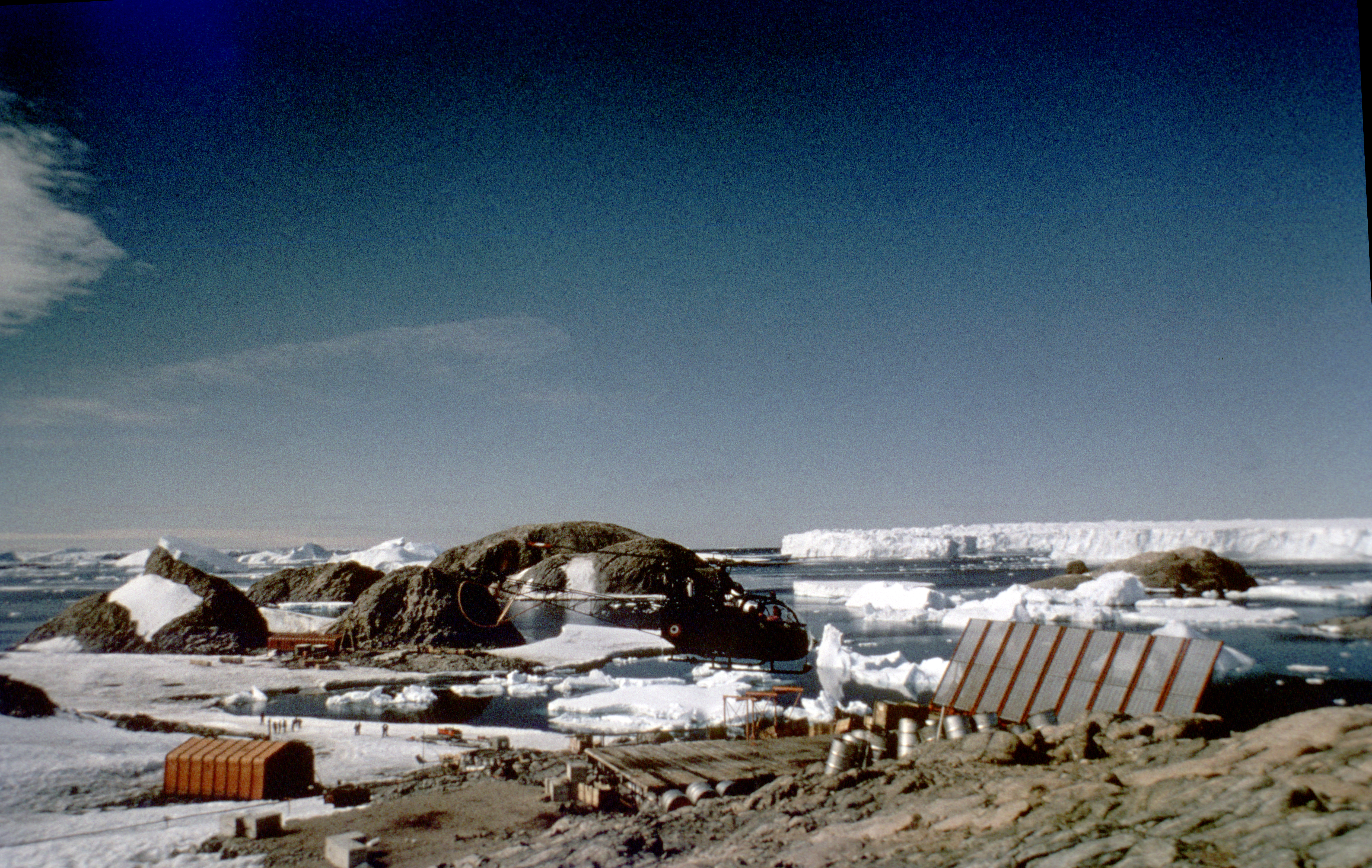 Buildings on rocky terrain.