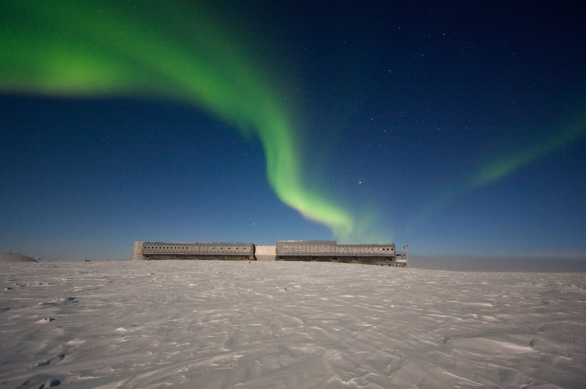 Aurora in the sky over a building.