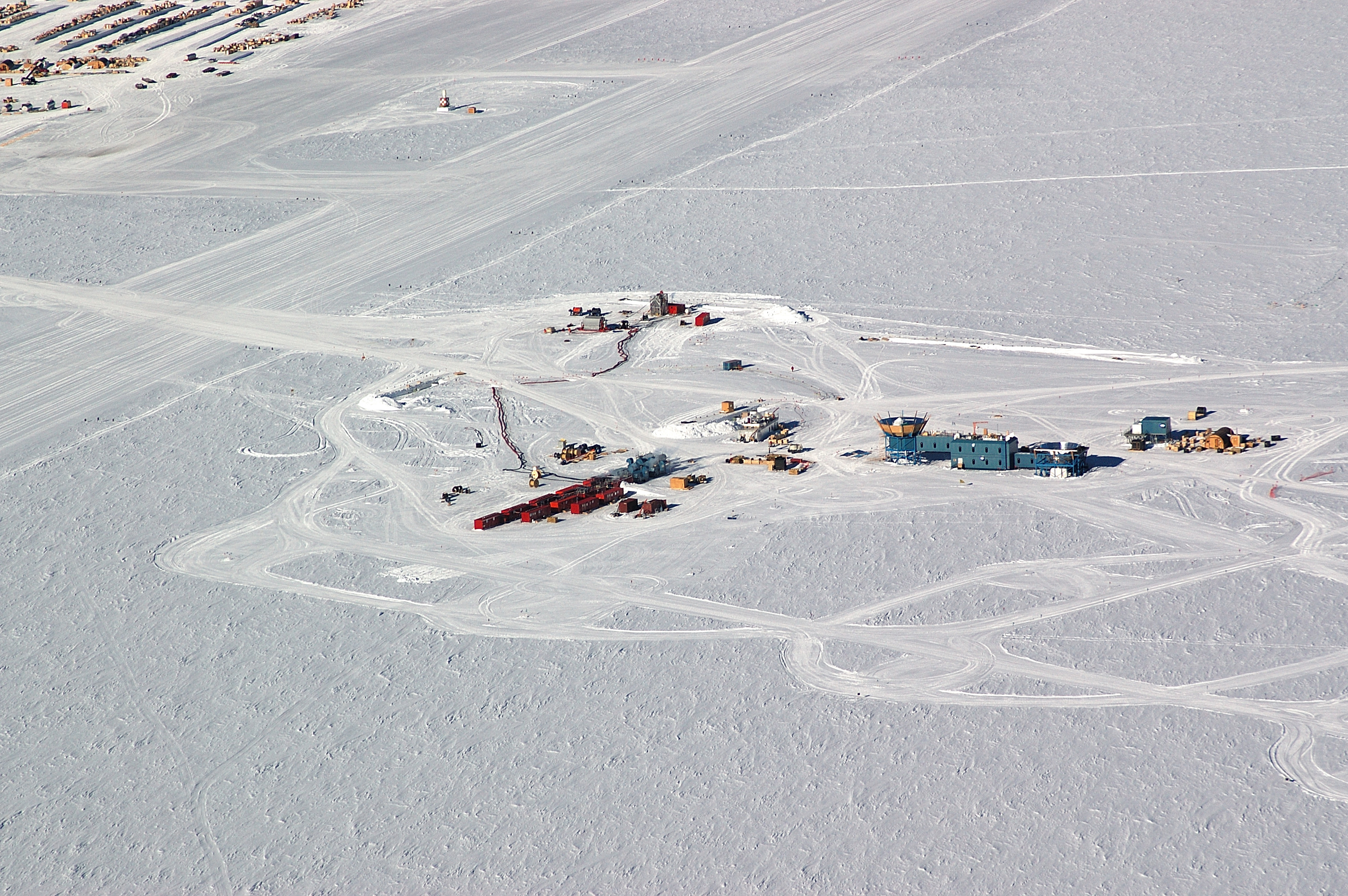 Aerial of buildings on snow.