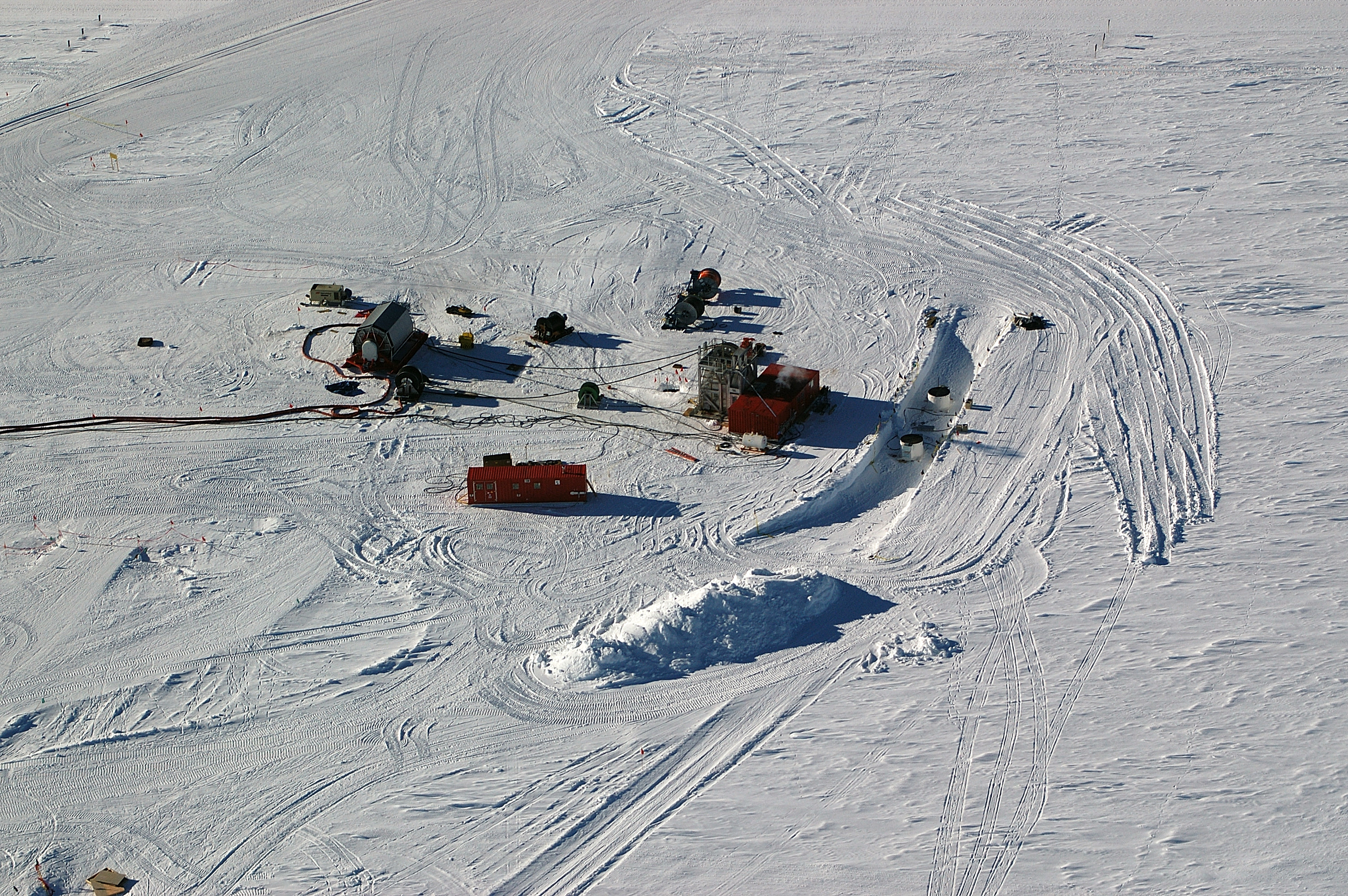 Aerial of buildings on snow.